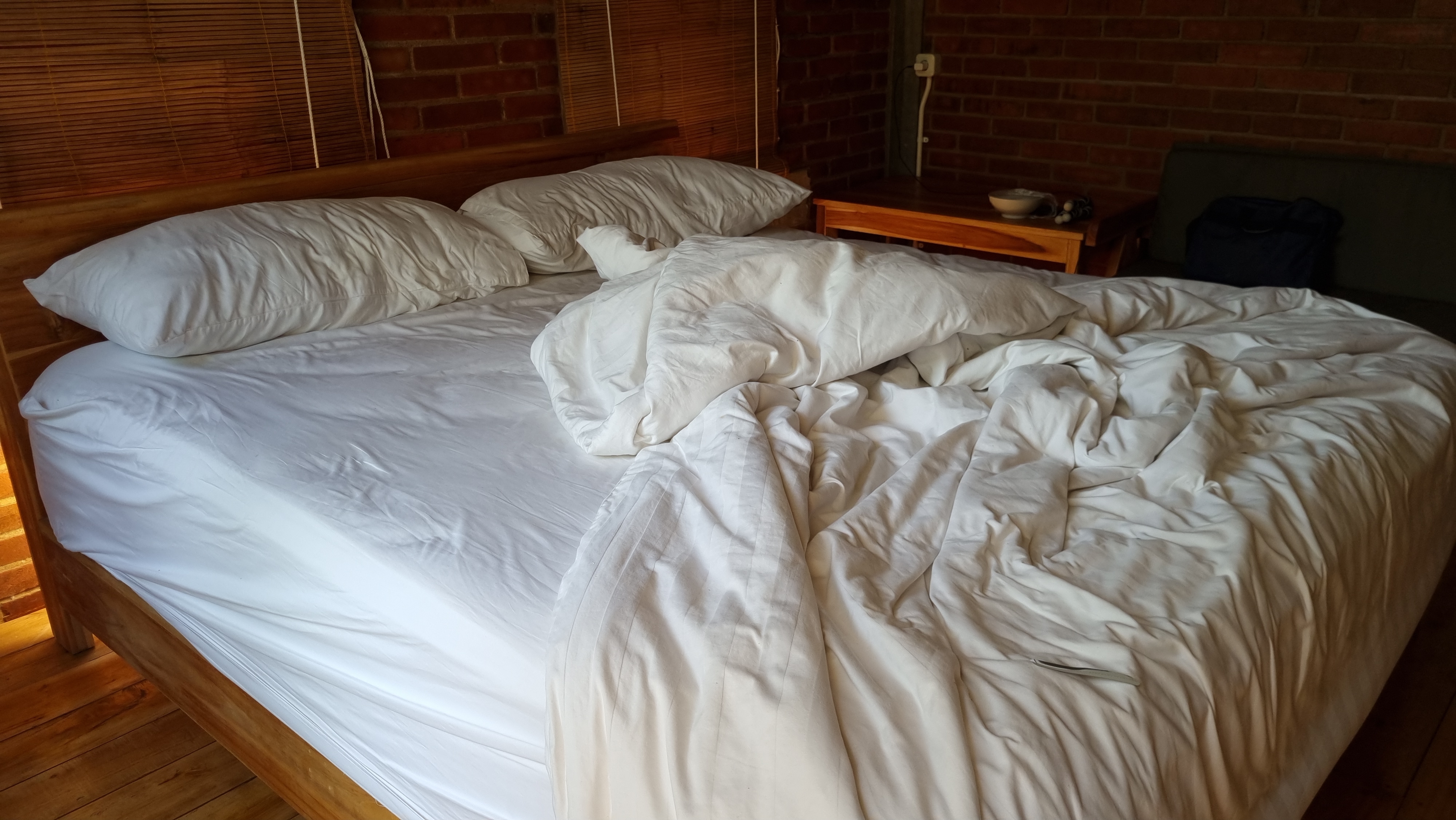 A messy, unmade bed | Source: Shutterstock