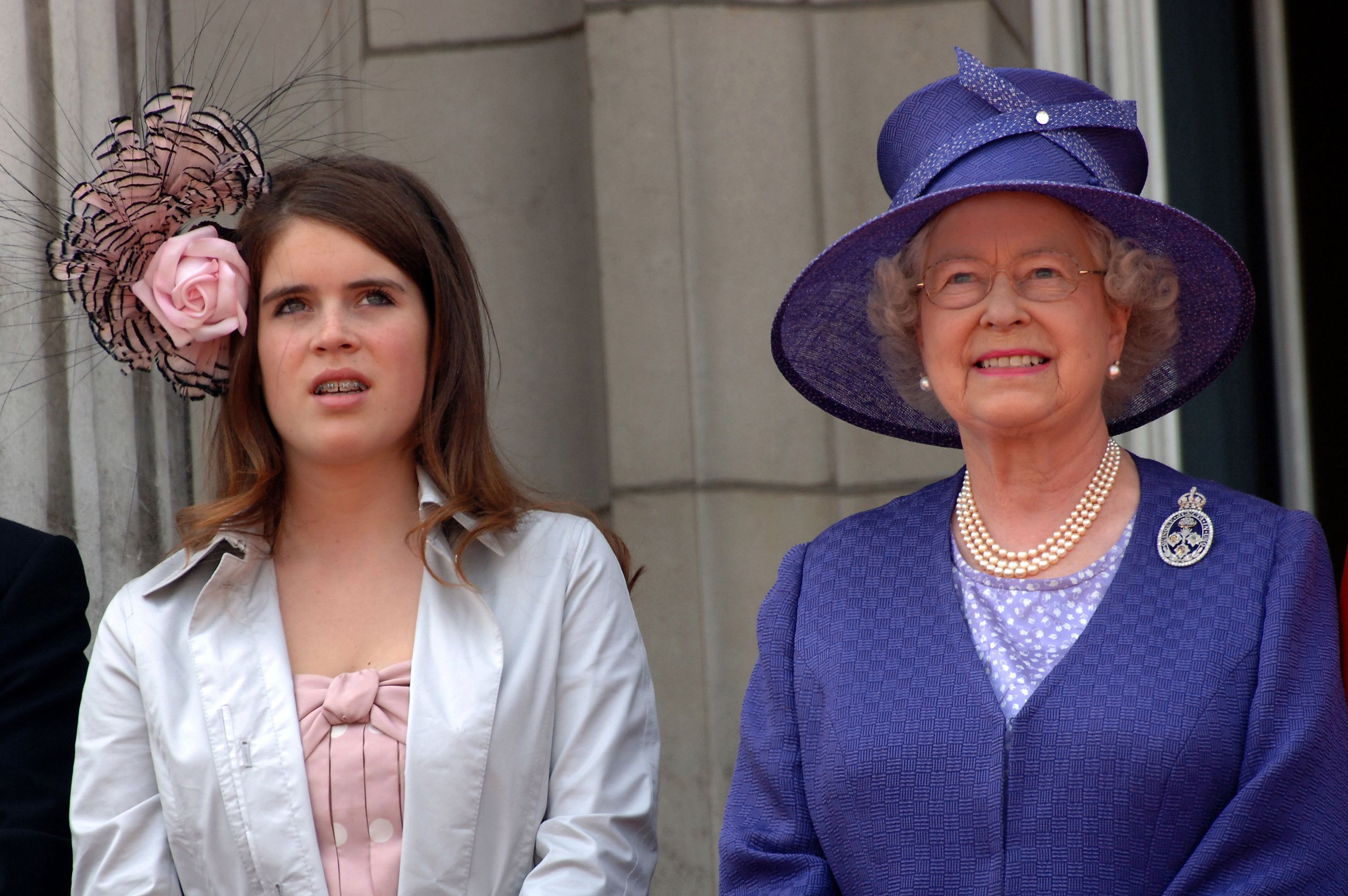 Princess Eugenie and Queen Elizabeth ll together on the balcony of Buckingham Palace following the Trooping the Colour ceremony on June 17, 2006, in London. | Source: Anwar Hussein/WireImage/Getty Images