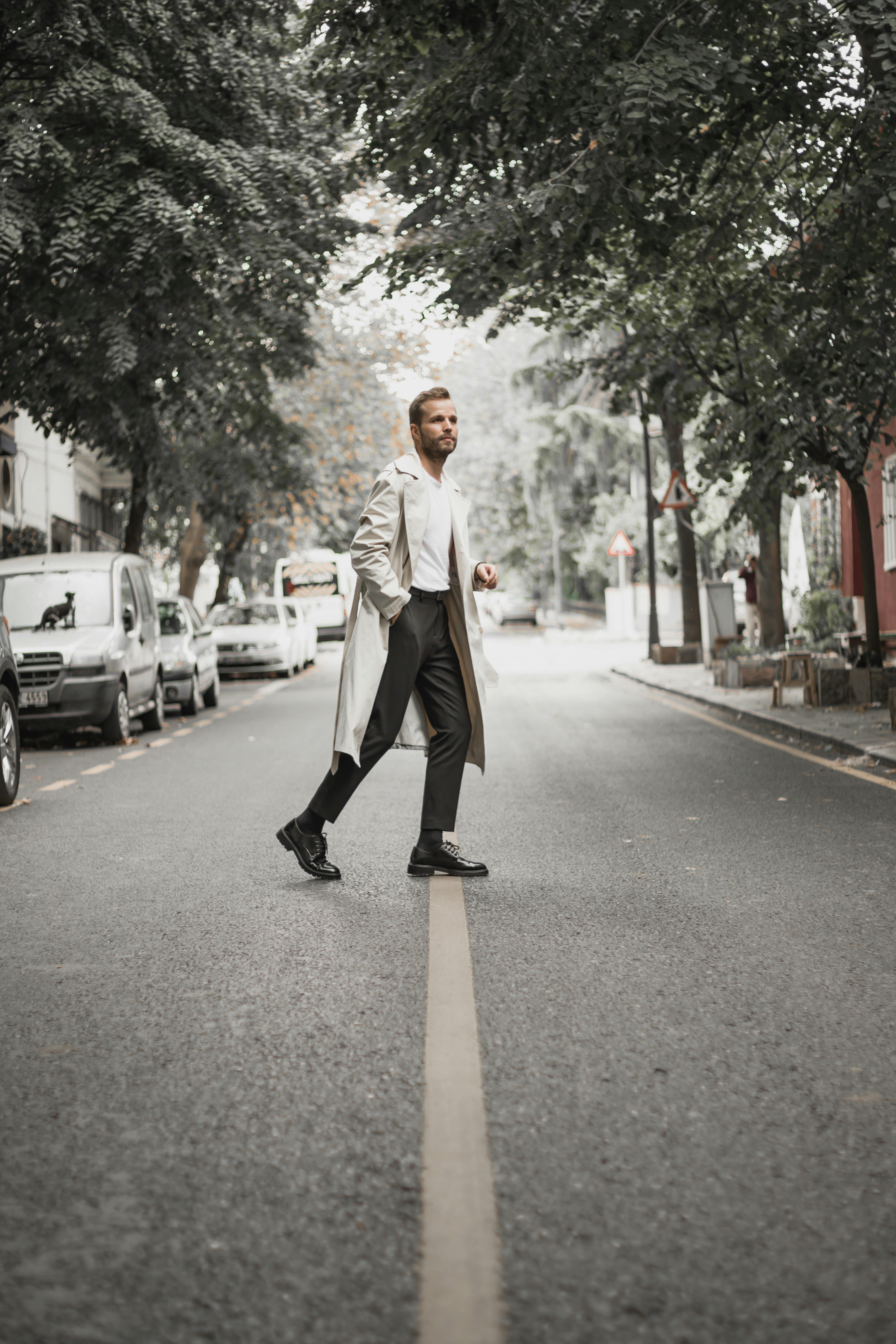 A man walking on a road | Source: Pexels