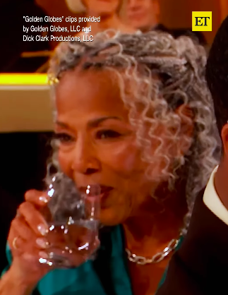 Donna Jordan taking a sip of water. | Source: Instagram/entertainmenttonight