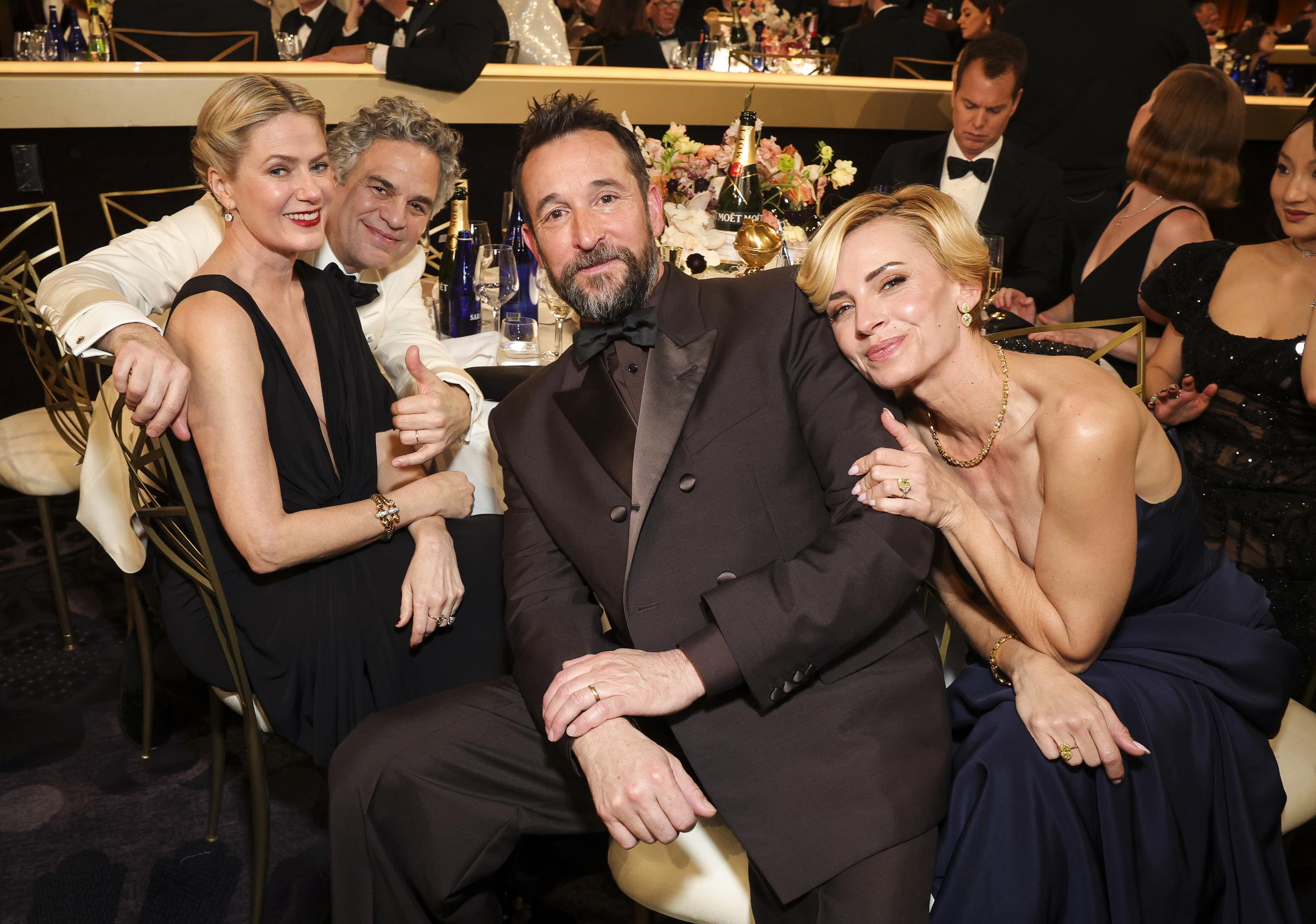 Sunrise Coigney, Mark Ruffalo, Noah Wyle, and Sara Wells gather in good spirits, radiating camaraderie and Golden Globes charm in this cozy group moment.