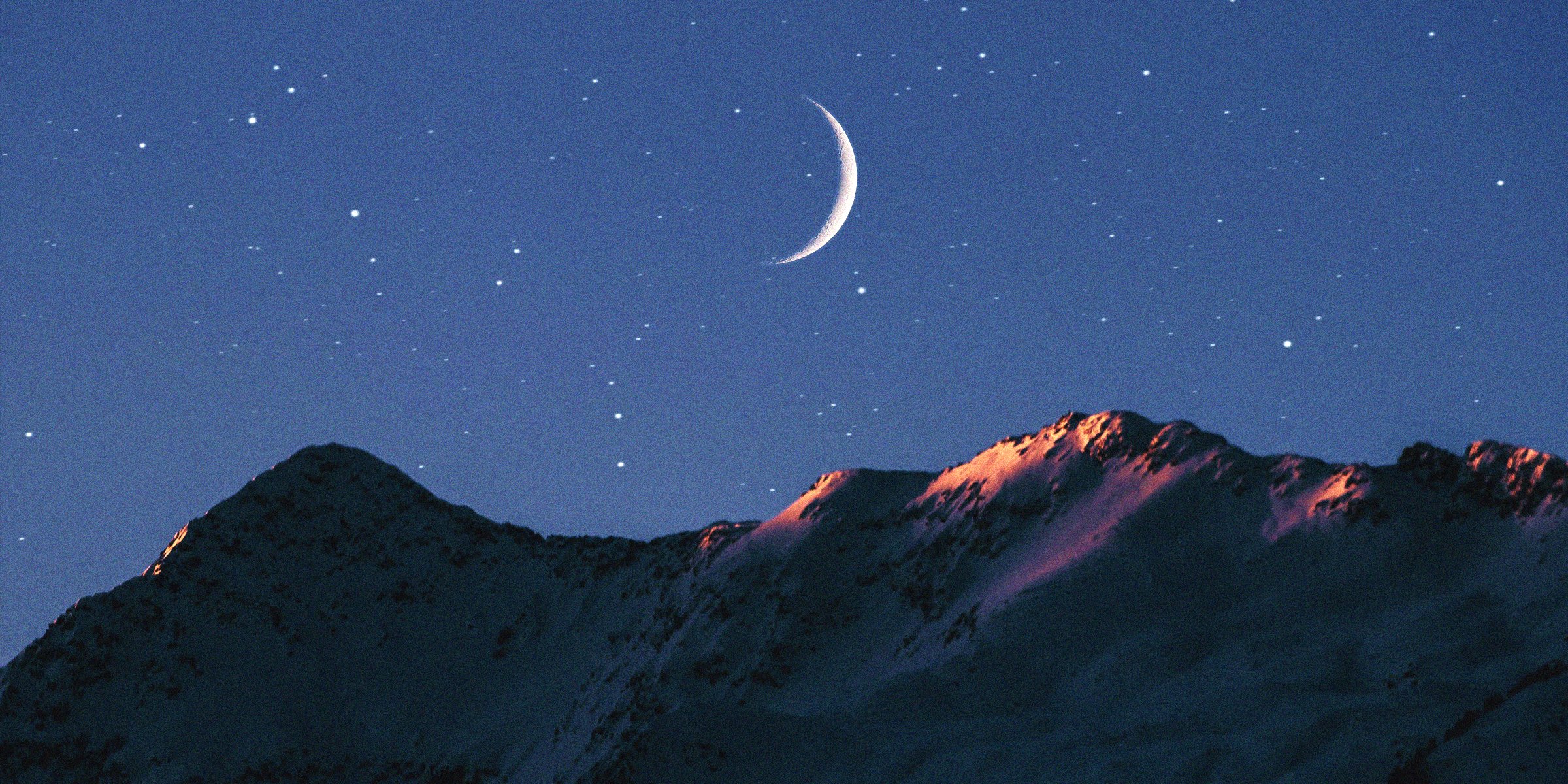 unsplash.com | Crescent Moon Over Mountains 