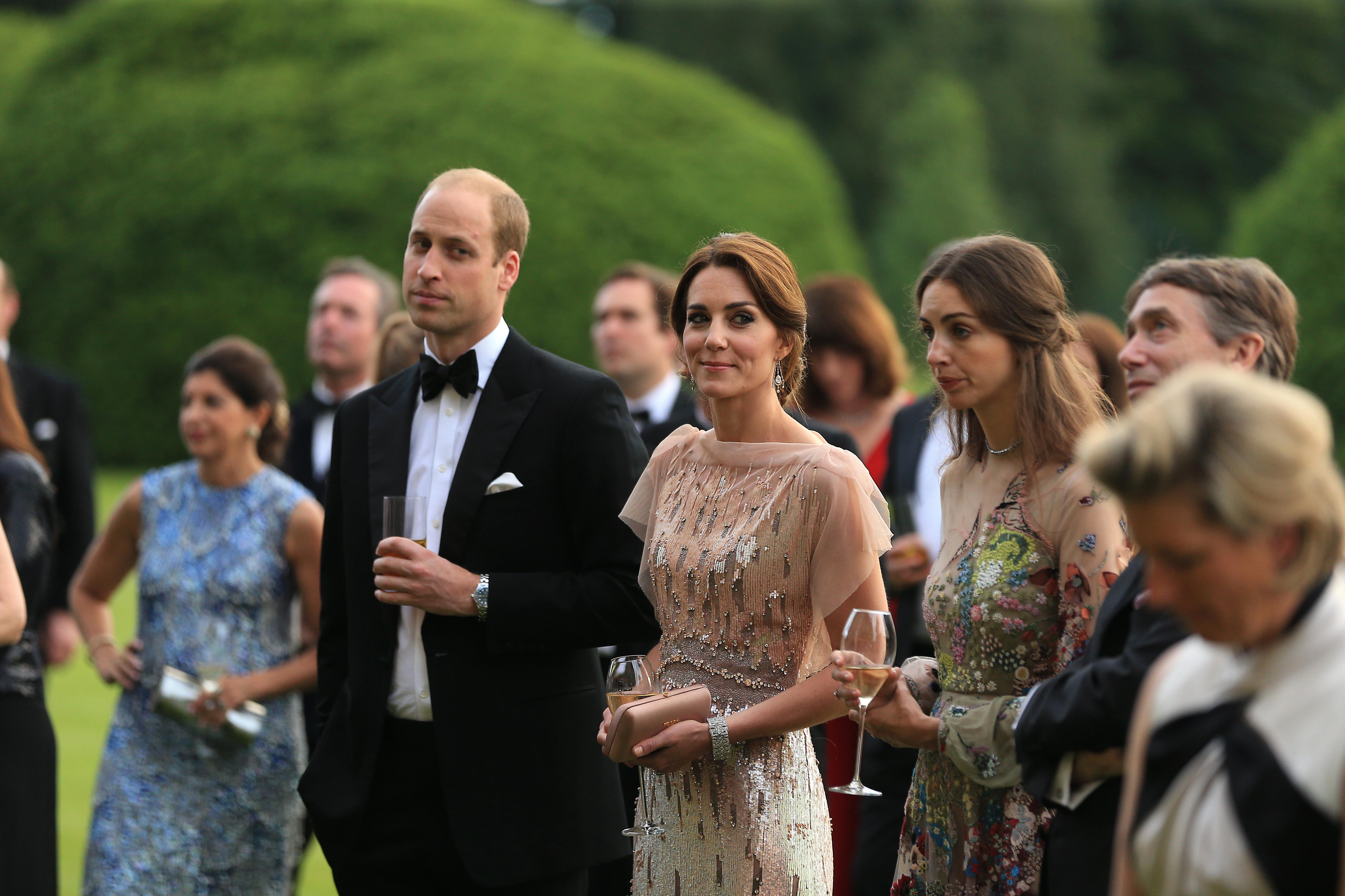 Prince William, Catherine, Duchess of Cambridge, David Cholmondeley, Marquess of Cholmondeley and Rose Cholmondeley, the Marchioness of Cholmondeley at a gala dinner on June 22, 2016 in King's Lynn, England | Source: Getty Images