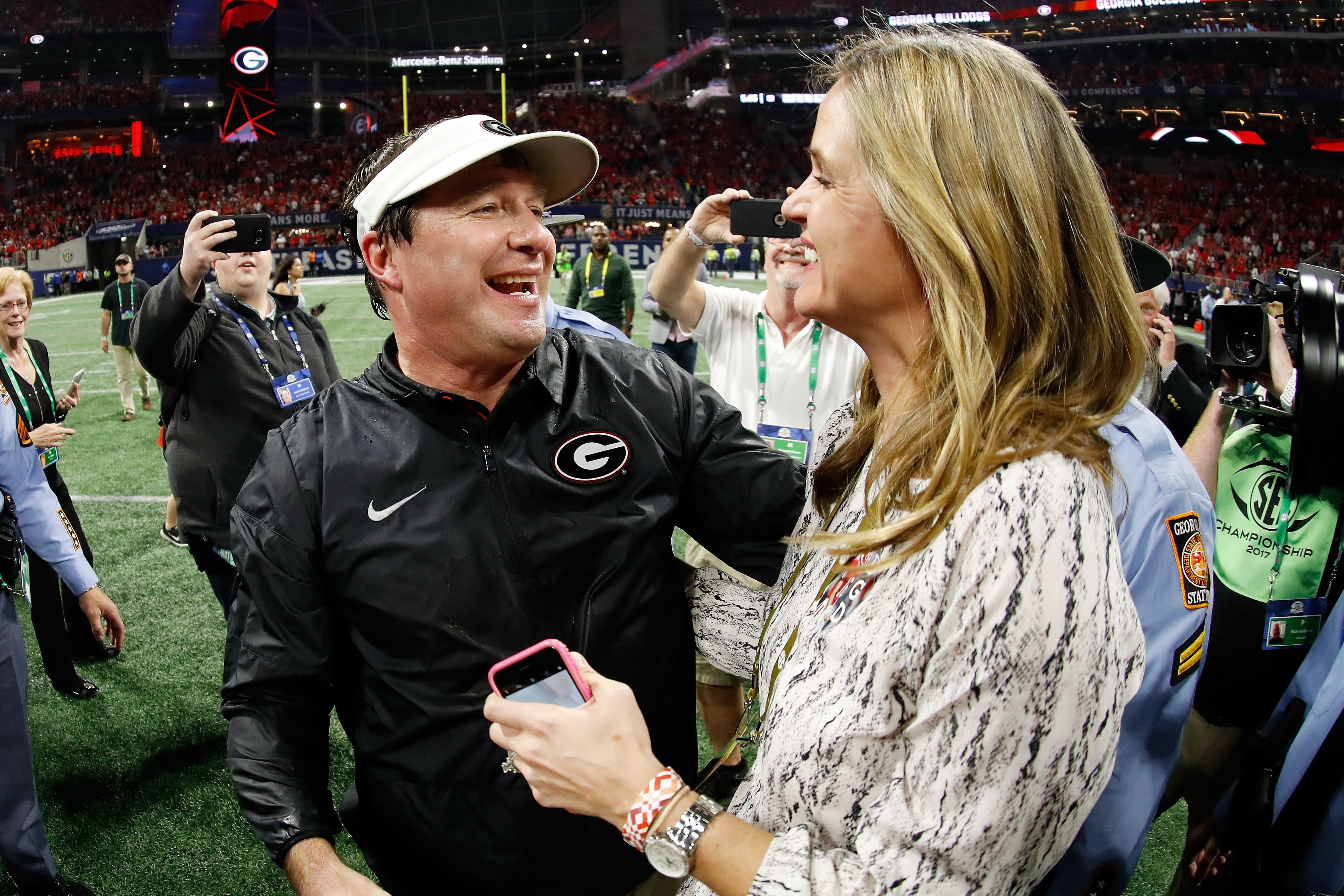 Kirby Smart with his wife, Mary Beth Lycett, at Mercedes-Benz Stadium on December 2, 2017, in Atlanta, Georgia. | Source: Getty Images