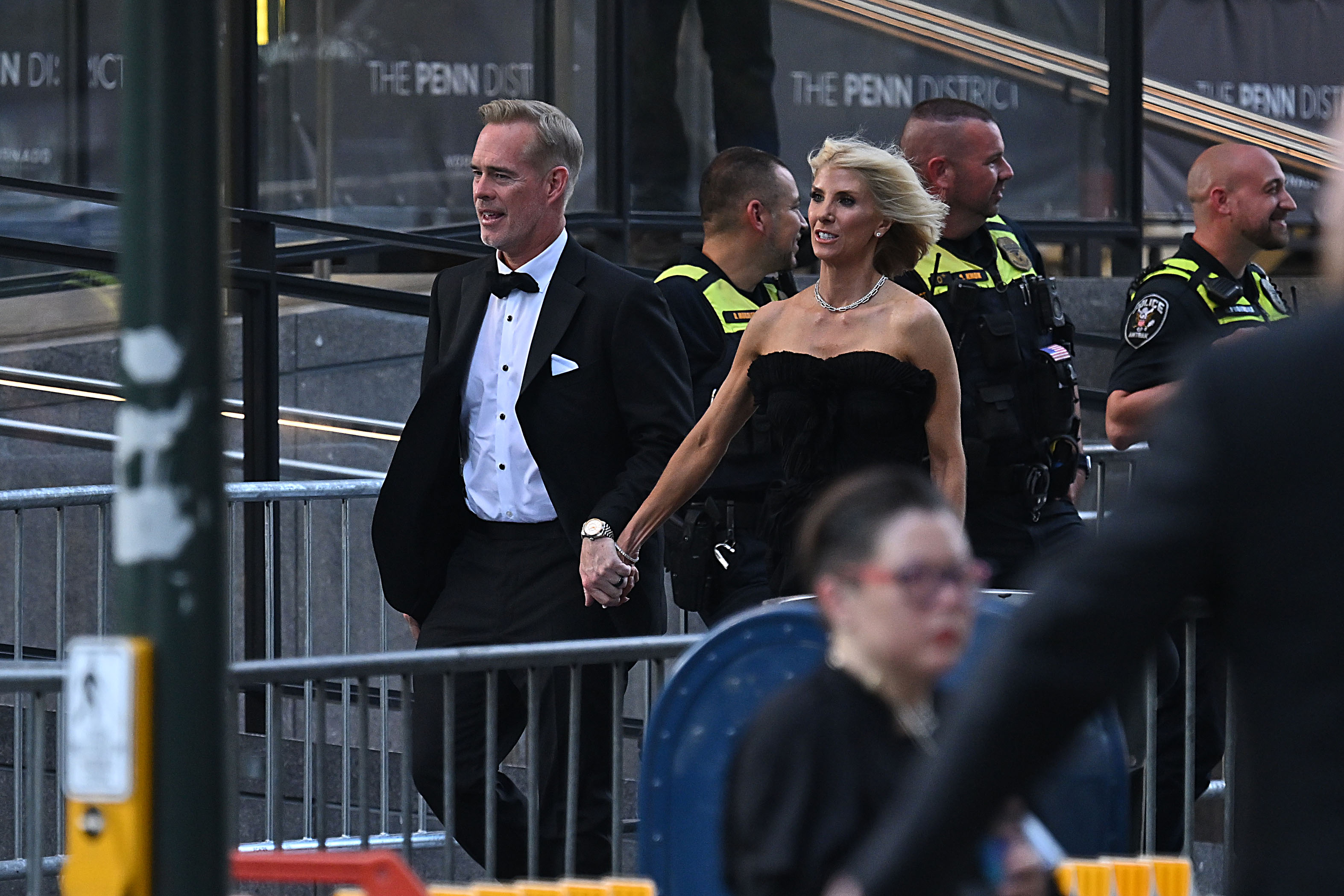 Joe Buck and his wife, Michelle Beisner-Buck, arrive at Madison Square Garden on July 3, 2026, for Taylor Swift and Travis Kelce's wedding. They were among the many guests photographed outside the venue before the ceremony. | Source: Getty Images