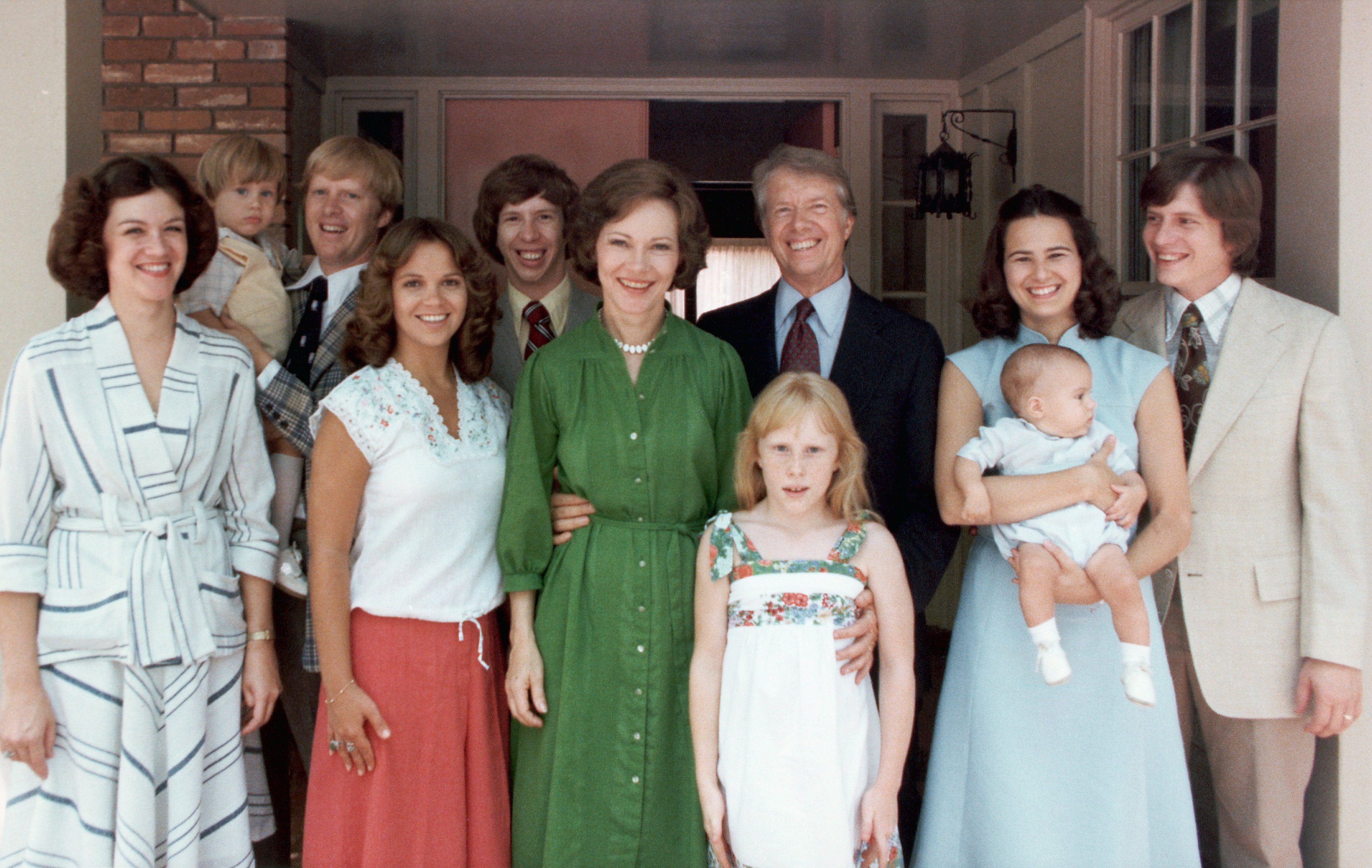 Former U.S. First Lady Rosalynn Carter and former U.S. President Jimmy Carter with their family pictured in a family portrait around 1977-1980 | Source: Getty Images