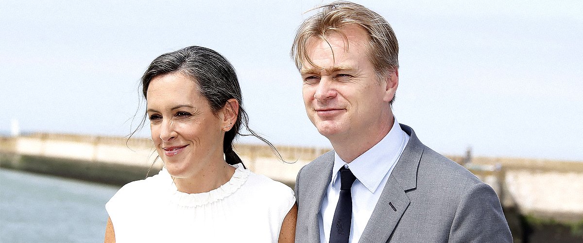 Producer Emma Thomas and Director Christopher Nolan pose for "Dunkirk" Photocall on July 16, 2017 | Source: Getty Images