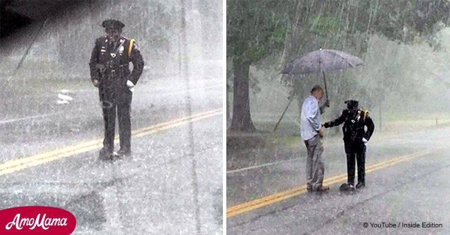 Couple sees cop standing in pouring rain to help a little animal