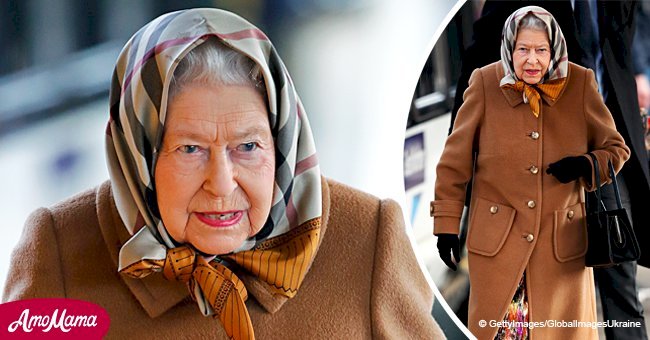 Queen travels by public train wearing a cozy headscarf at the start of her Christmas holidays