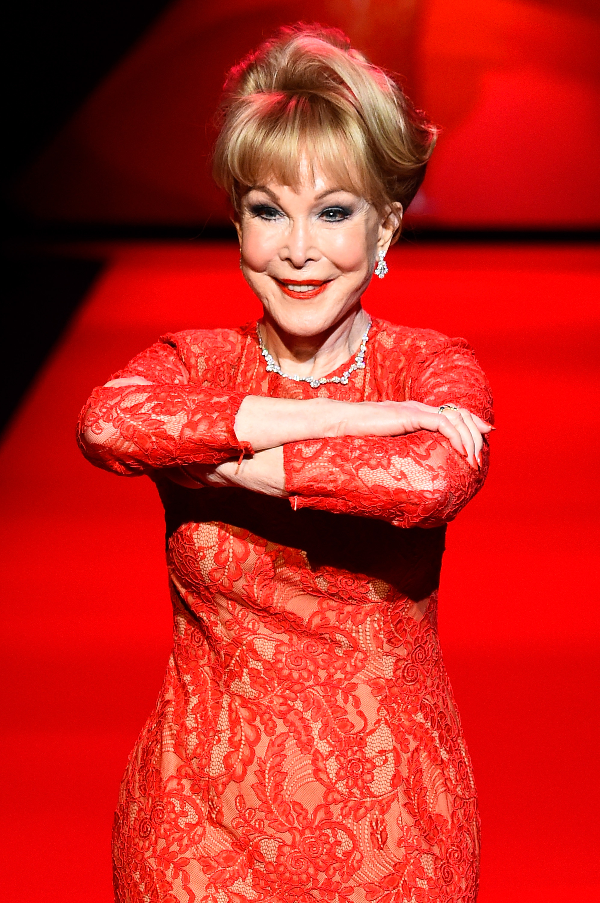 Barbara Eden walks the runway at the Go Red For Women Red Dress Collection 2015 presented by Macys fashion show during Mercedes-Benz Fashion Week Fall 2015 on February 12, 2015, in New York City. | Source: Getty Images