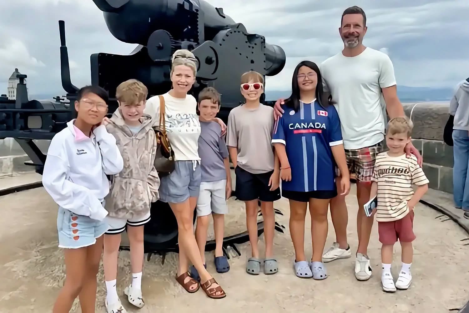 The Karolkiewicz family posing in front of a cannon in a tourist attraction, in a photo posted on July 29, 2026. | Source: Facebook/Therealbiggdracco