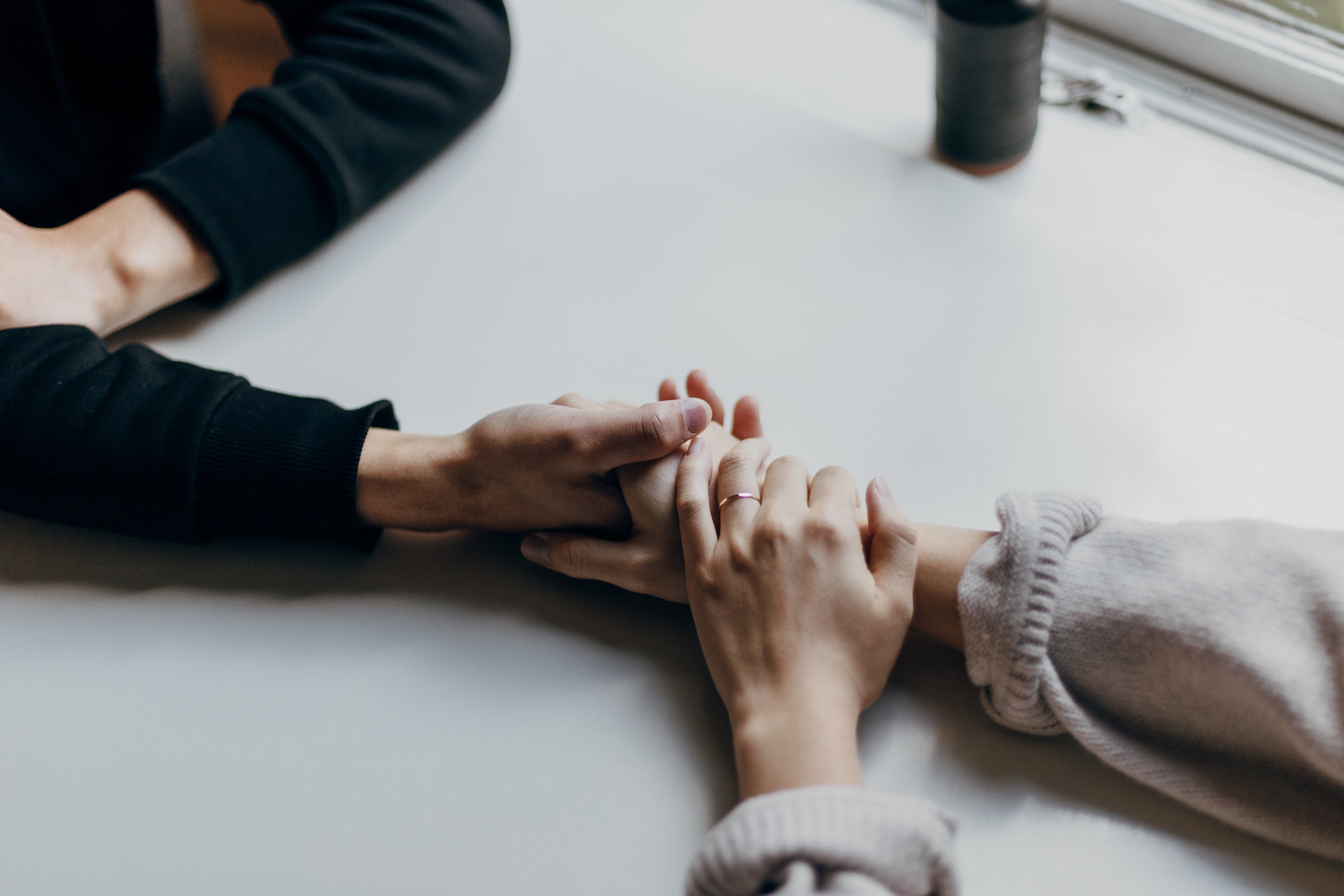 Clara saw Russel holding Ellie's hand. | Source: Unsplash