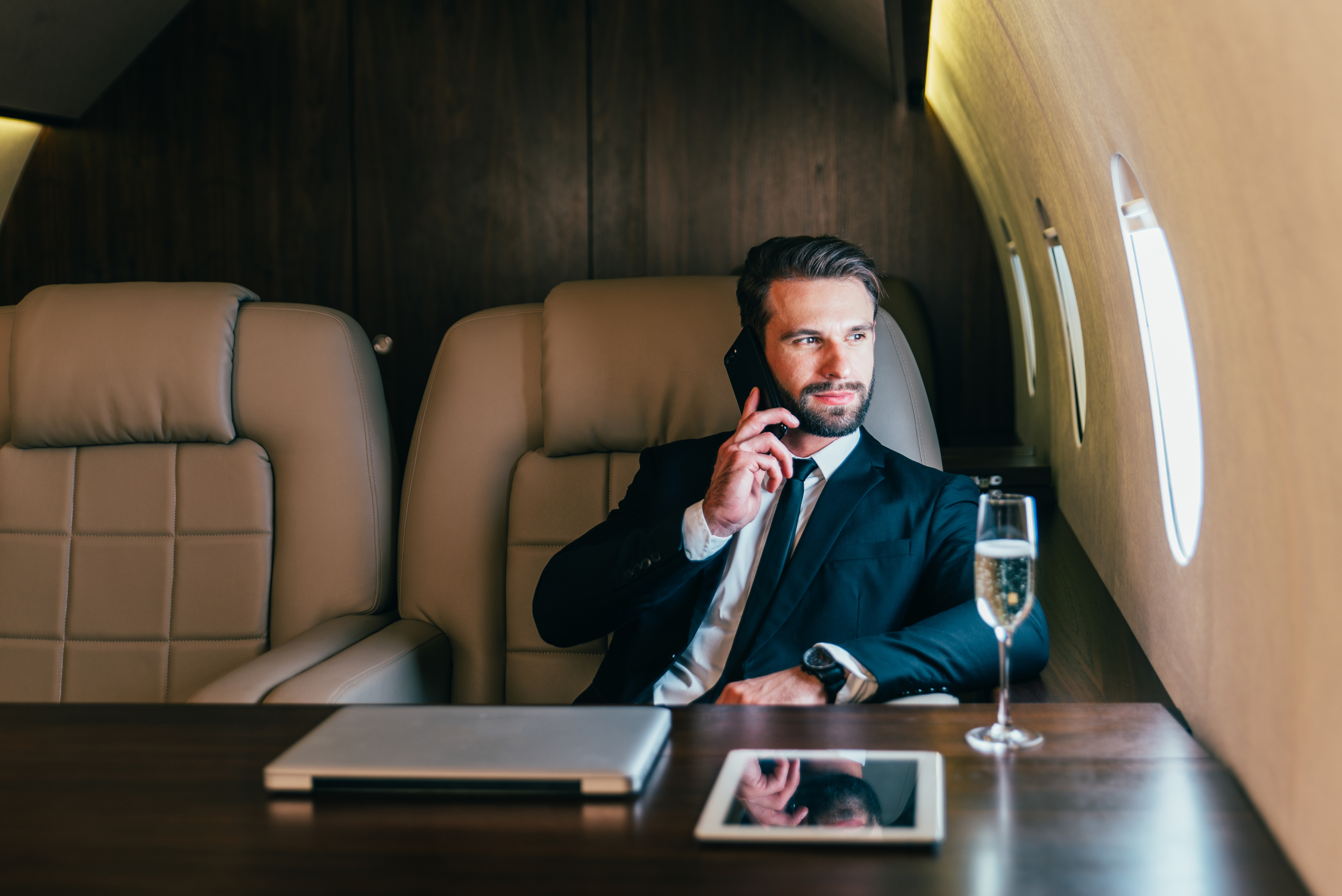 Businessman flying on his private jet | Source: Shutterstock