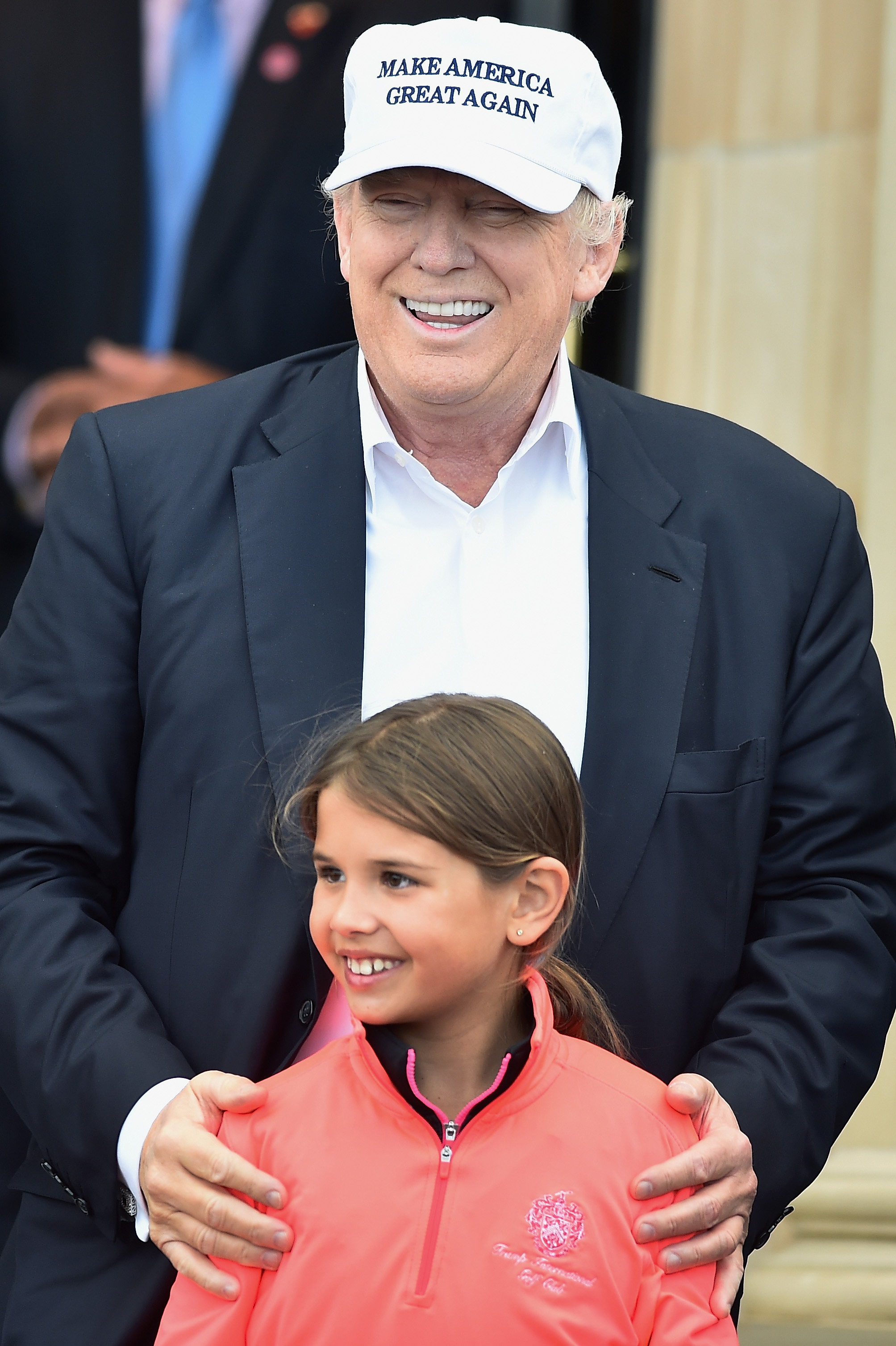 Donald Trump and his granddaughter Kai Trump arrive at his Trump Turnberry Resort on June 24, 2016 in Ayr, Scotland | Source: Getty Images