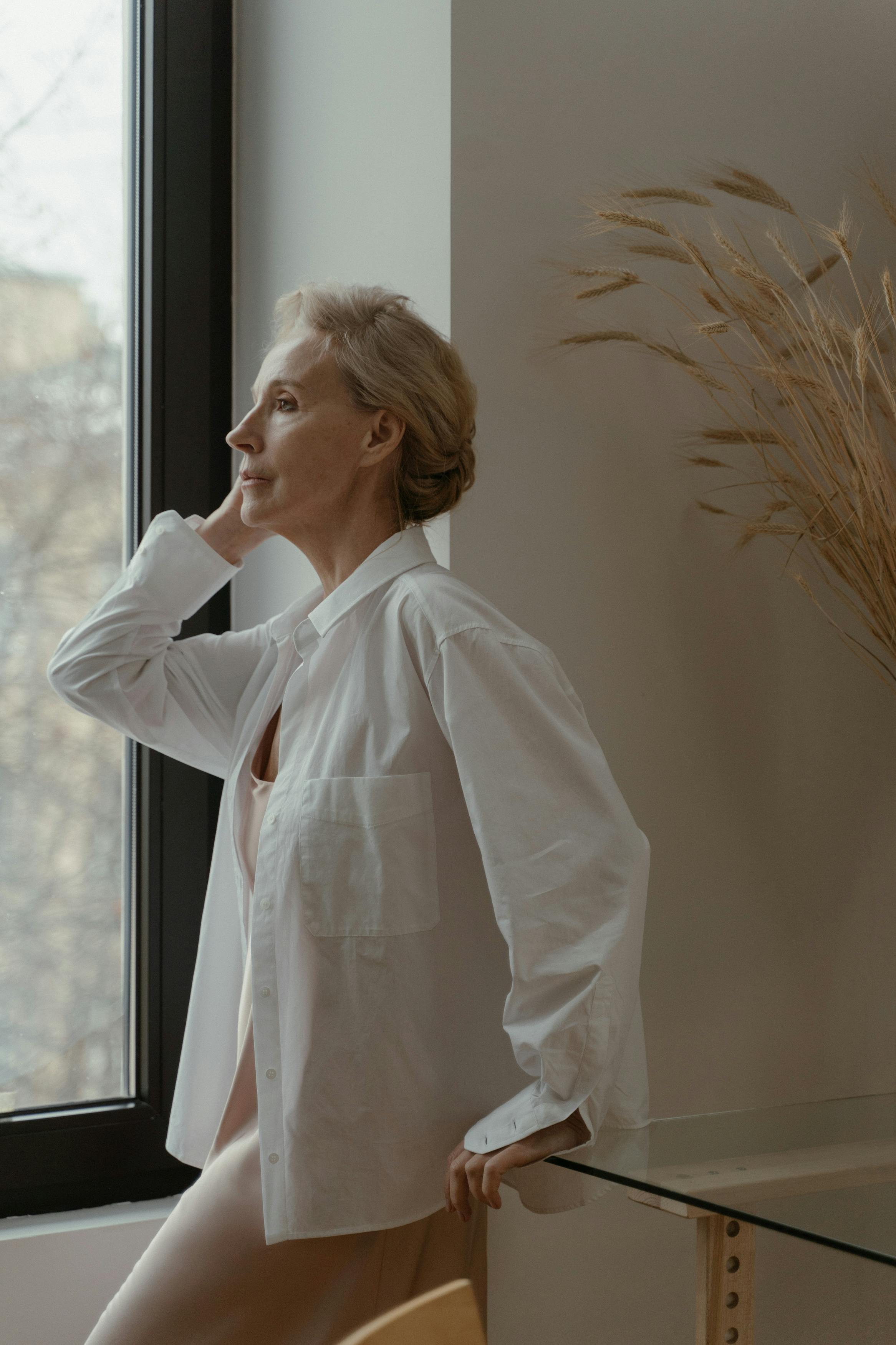A white button-down shirt remains one of the most versatile wardrobe staples. | Source: Pexels