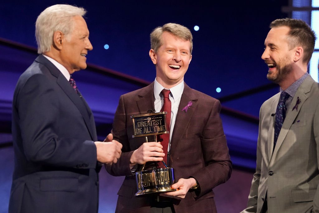 Alex Trebek (left), Ken Jennings (center) and Brad Rutter on "Jeopardy! The Greatest Of All Time" which premiered 7 January. | Photos: Getty Images.