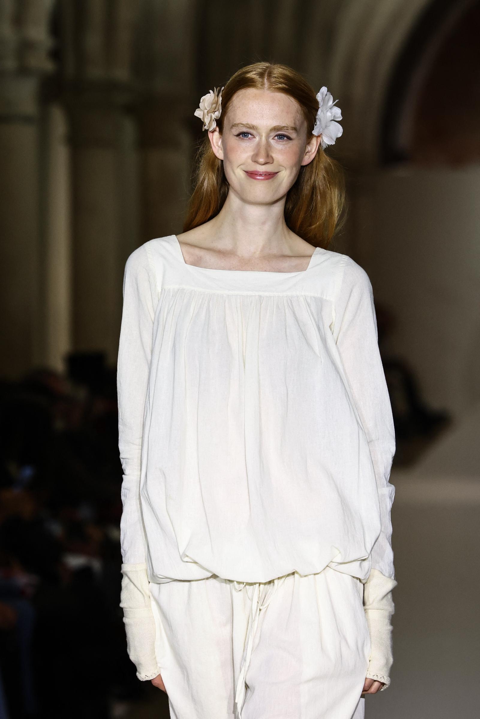 A model presents a creation by Agnes B for the Women Ready-to-wear Spring-Summer 2026 collection as part of the Paris Fashion Week, in Paris on October 6, 2025. | Source: Getty Images