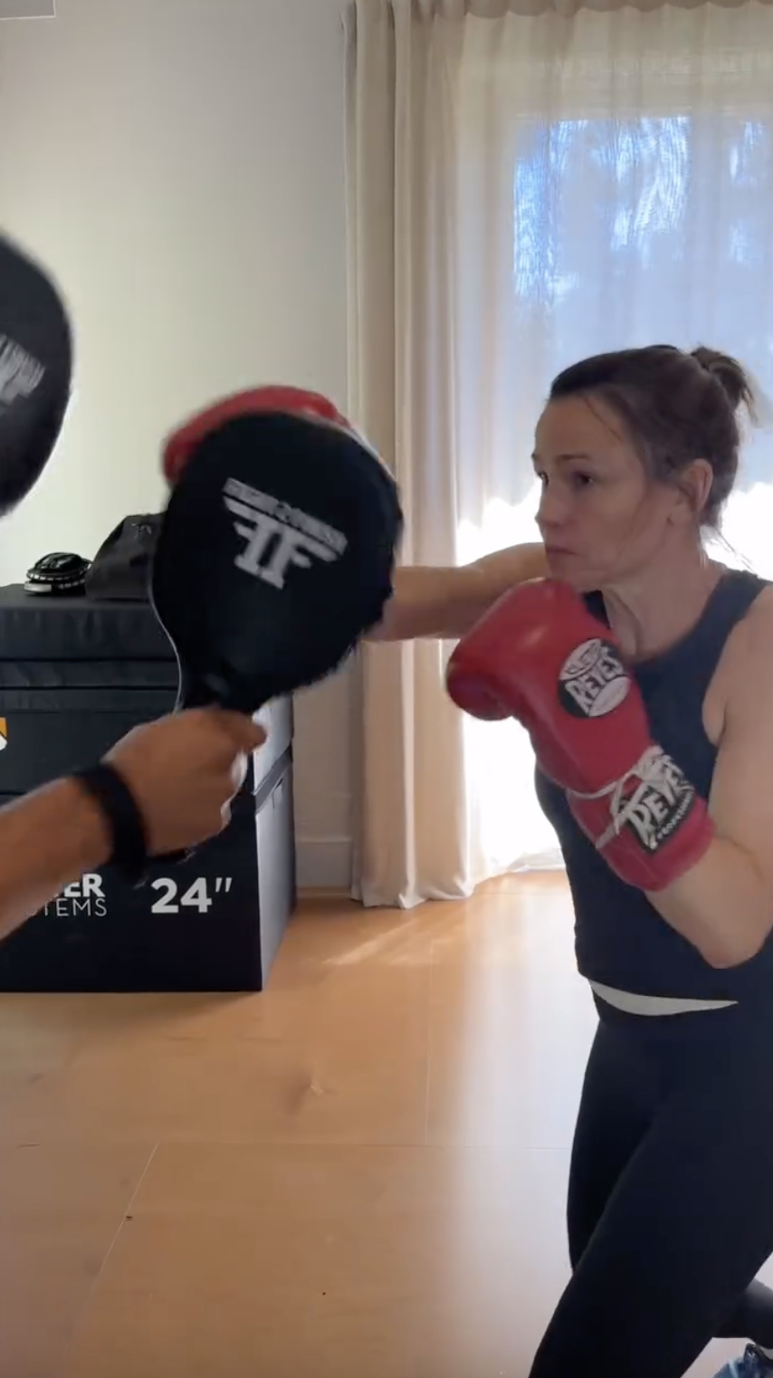 A screenshot from a video of Jennifer Garner during a boxing workout, as part of her training for her role as Elektra, posted on August 6, 2024 | Source: Instagram/jennifer.garner