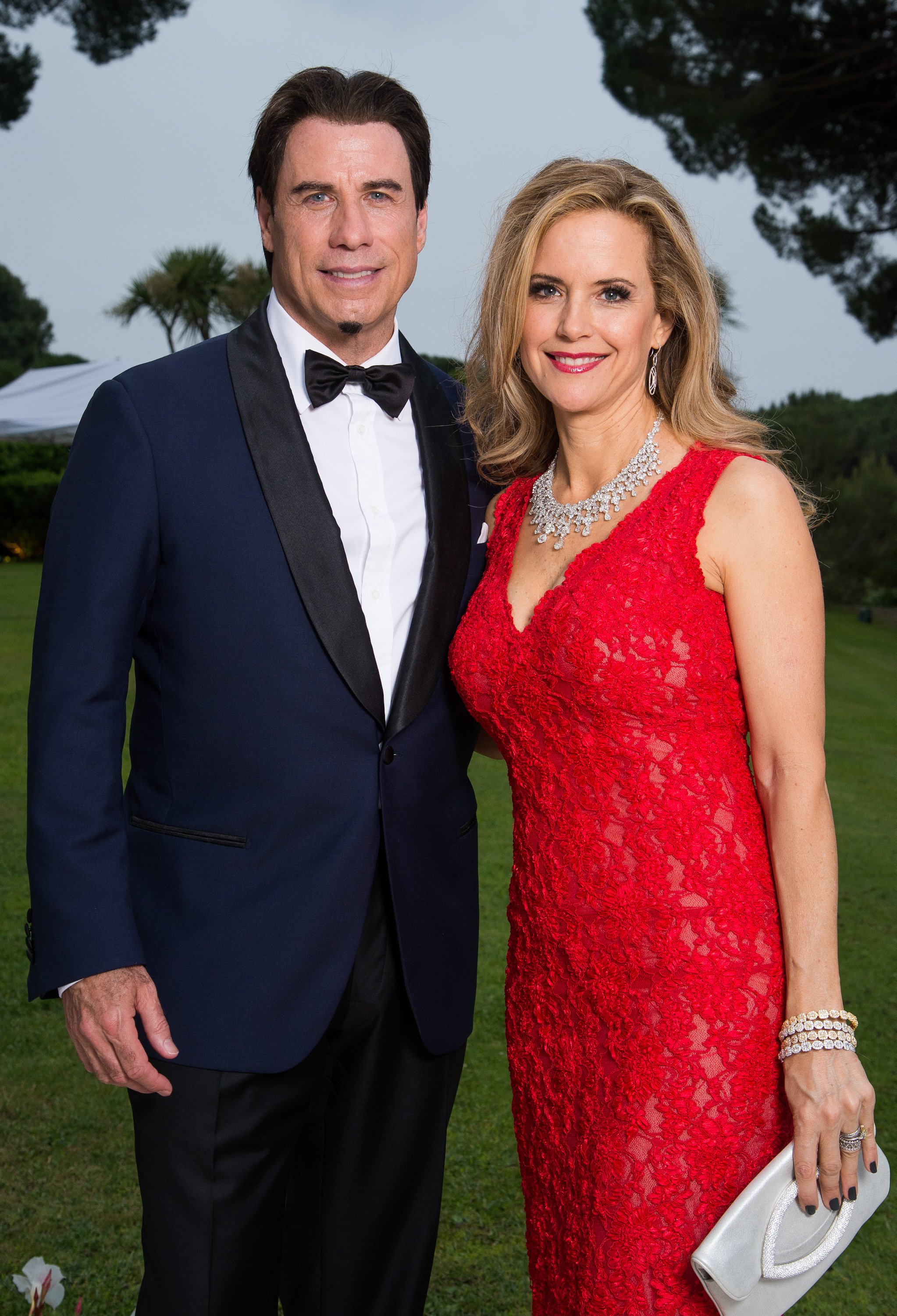John Travolta and Kelly Preston pose for a portrait at amfAR's 21st Cinema Against AIDS Gala Presented By WORLDVIEW, BOLD FILMS, And BVLGARI at Hotel du Cap-Eden-Roc on May 22, 2014, in Cap d'Antibes, France. | Source: Getty Images
