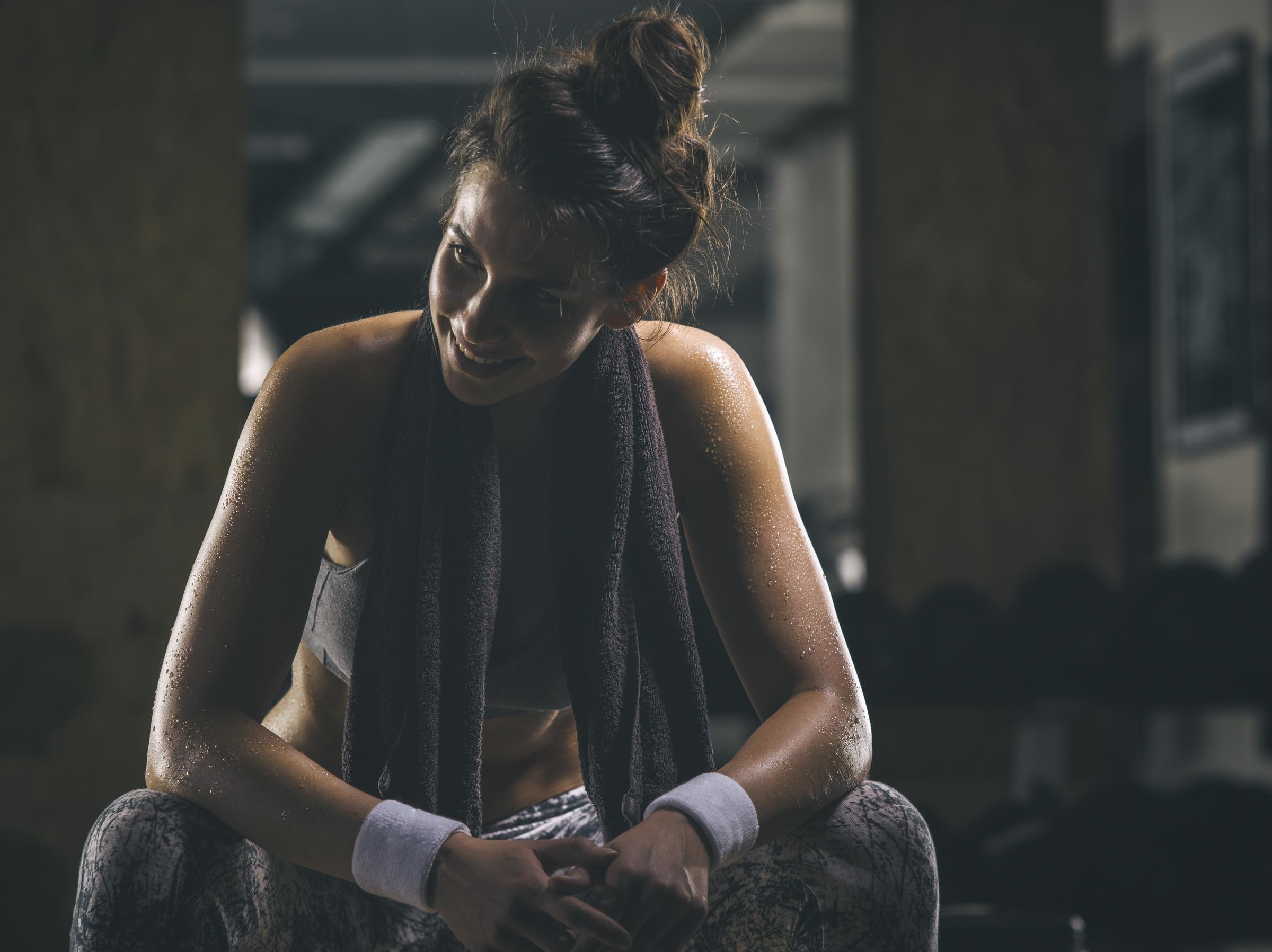 A woman resting following a workout | Source: Getty Images