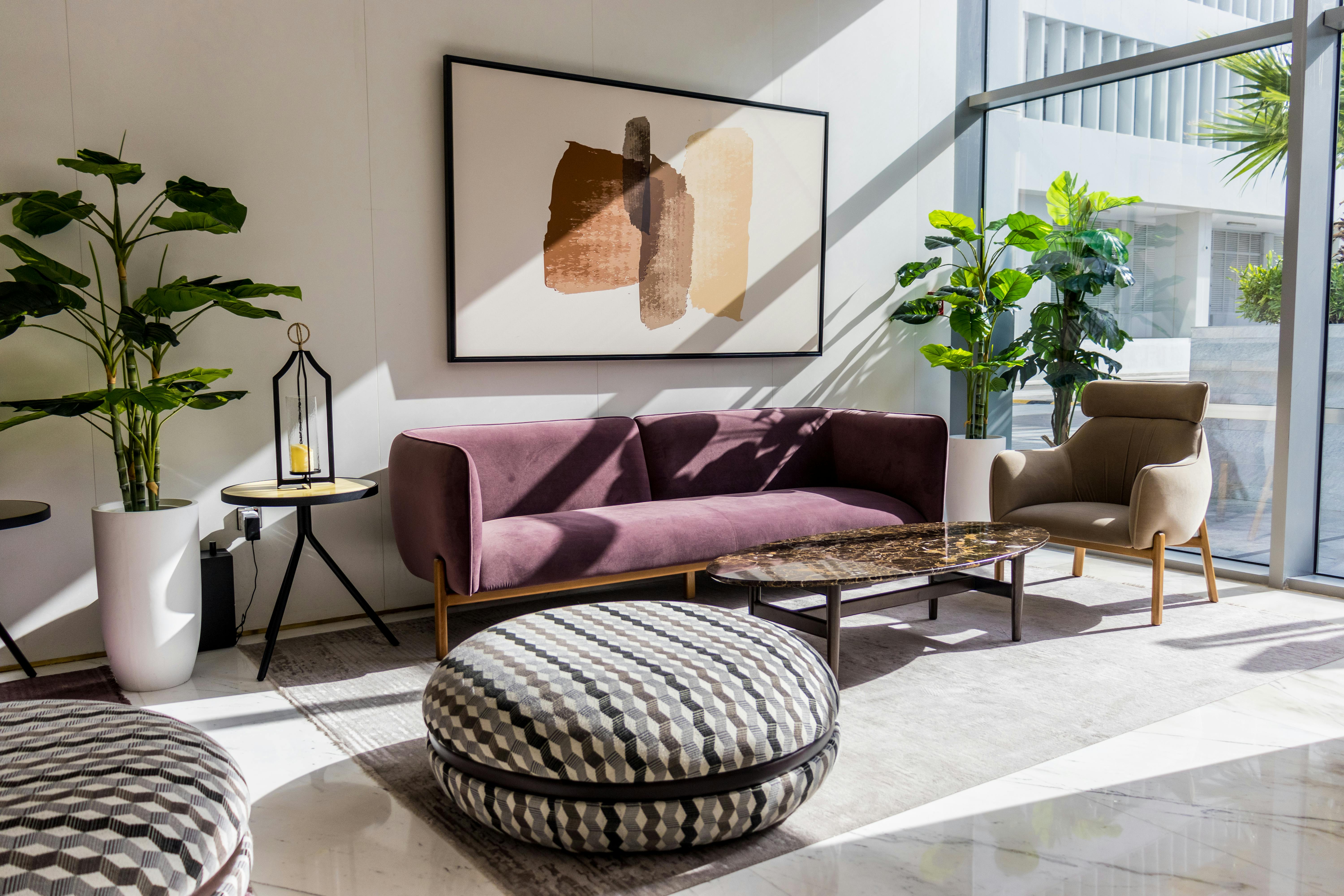 An airy living room with a textured pouf | Source: Pexels