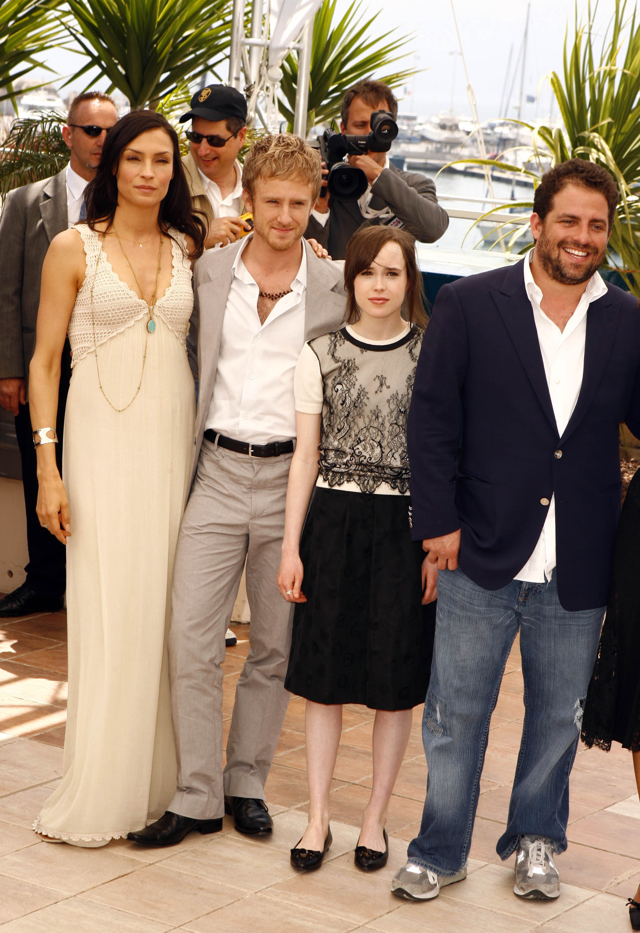 Elliot Page poses with Famke Janssen, Ben Foster, and Brett Ratner during the "X-Men : The Last Stand" photocall on May 22, 2006 | Source: Getty Images