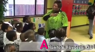 Wanda Smith interacting with children, posted on October 13, 2024 | Source: Instagram/v103atlanta