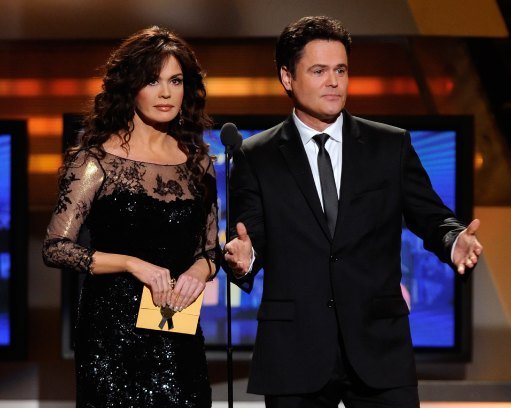 Marie and Donny Osmond present an award at the 46th Annual Academy of Country Music Awards | Photo: Getty Images