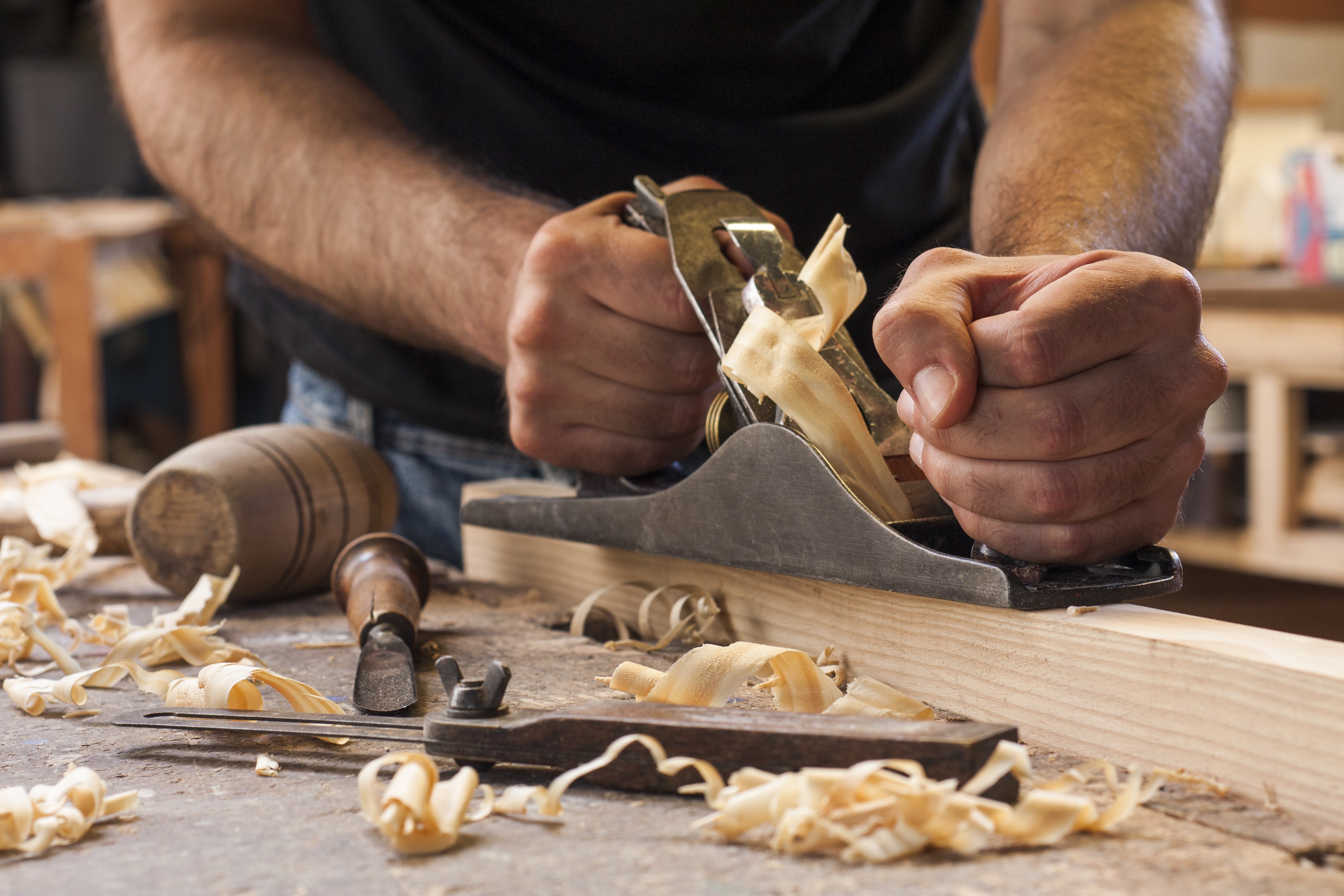 A carpenter working on his craft | Photo: Shutterstock 