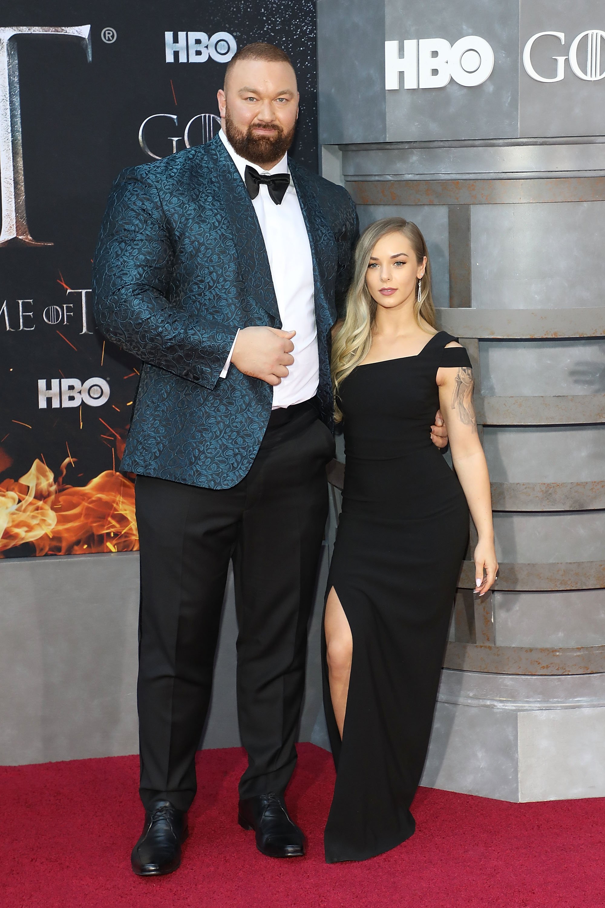Hafthor Julius Bjornsson and Kelsey Henson attend the premiere of "Game of Thrones" at Radio City Music Hall on April 3, 2019, in New York City. | Source: Getty Images.
