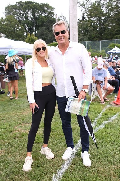 Alba Jancou and Peter Cook attend the East Hampton Artists and Writers Charity Softball Game on August 17, 2019 in East Hampton, New York | Photo: Getty Images