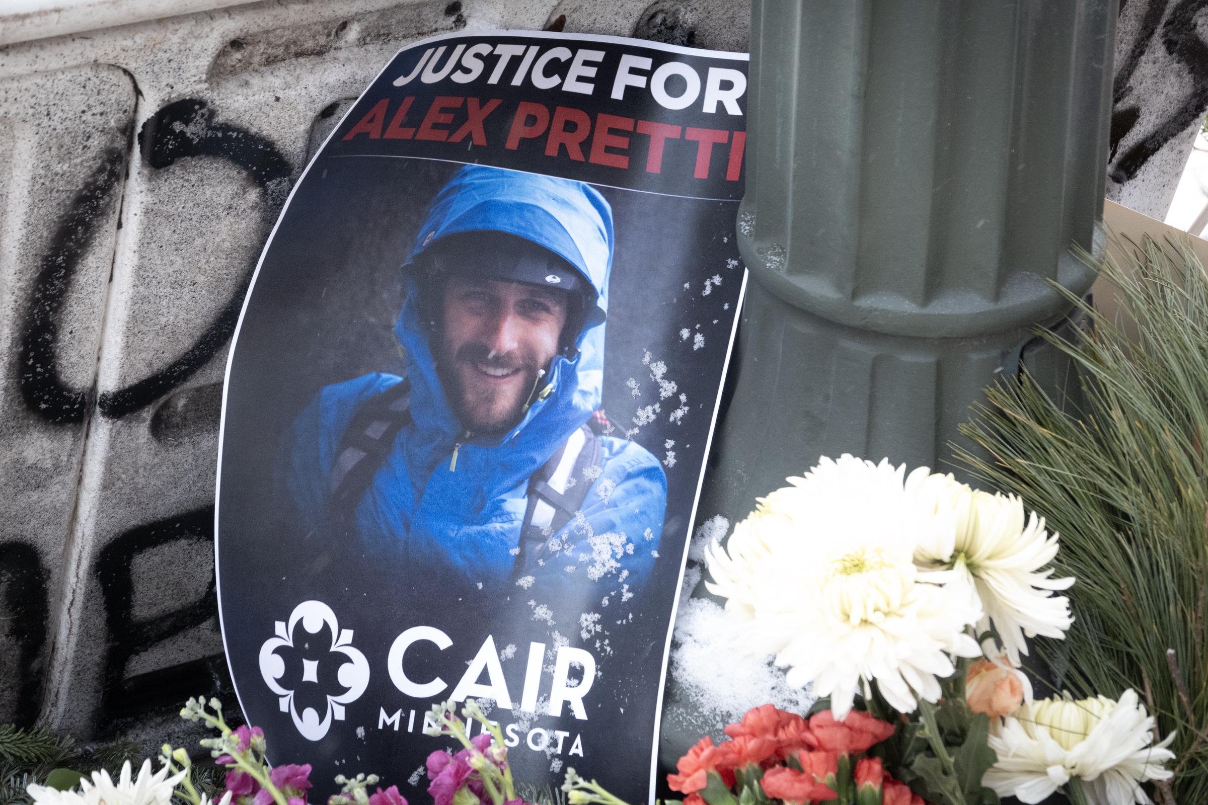 A picture sits at a memorial to Alex Pretti in Minneapolis, Minnesota on January 25, 2026. | Source: Getty Images