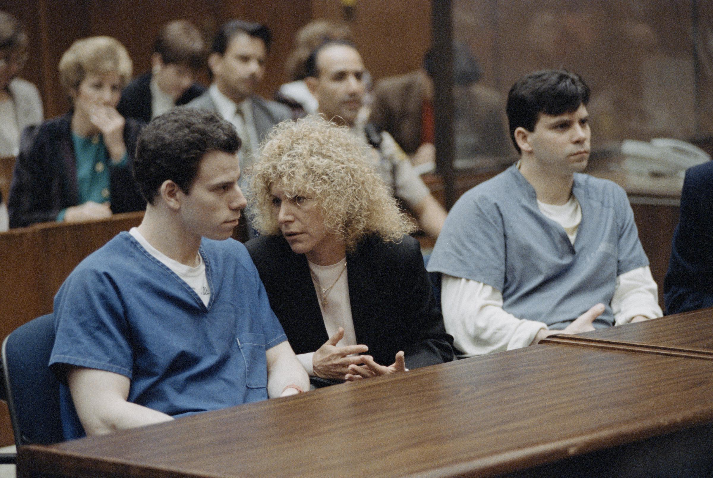 Erik Menendez with his attorney, Leslie Abramson, and his brother Lyle Menendez in Los Angeles, on March 9, 1994 | Source: Getty Images