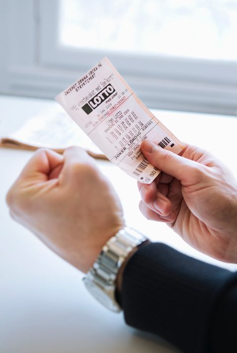 Man with lottery ticket | Source: Getty Images