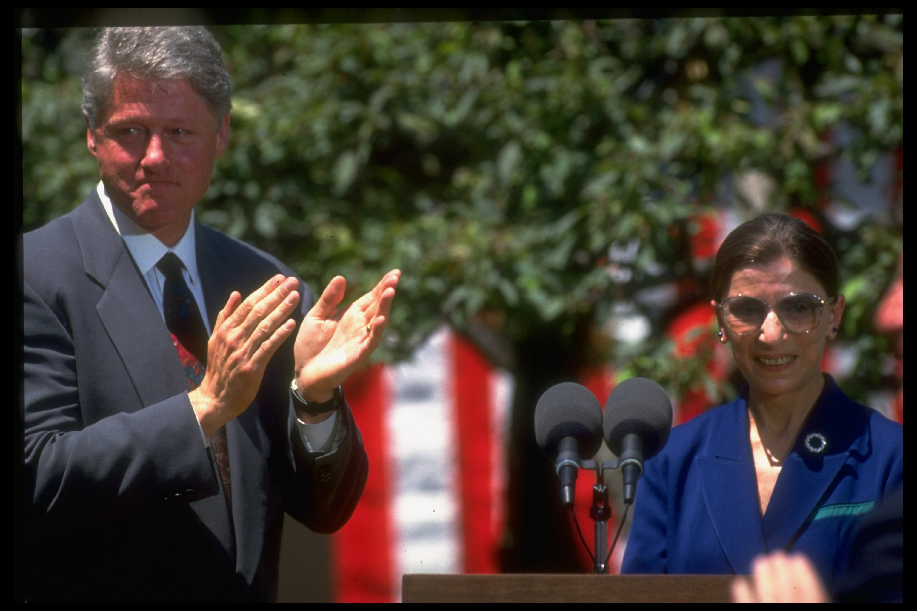 Former United States President Bill Clinton applauding Judge Ruth Bader Ginsburg after Supreme Court nominee's acceptance speech at the White House Rose Garden in Washington D.C. | Photo: Dirck Halstead/The LIFE Images Collection via Getty Images/Getty Images