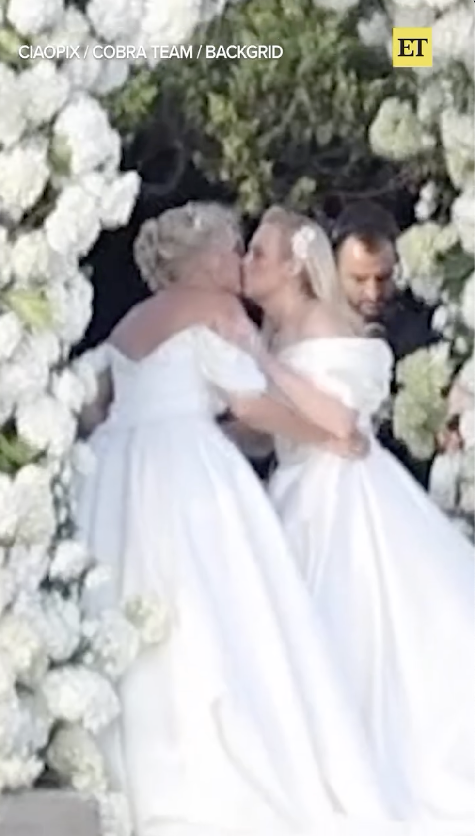 Rebel Wilson and Ramona Agruma sealing their vows with a kiss posted on September 30, 2024 | Instagram/entertainmenttonight