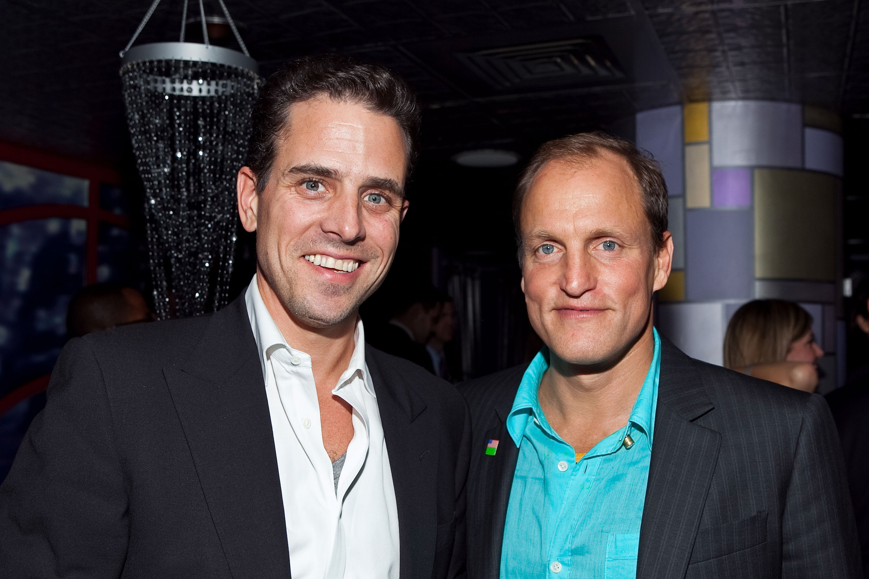 Hunter Biden poses with actor Woody Harrelson at the after-party for the IMPACT Film Festival’s screening of "The Messenger," on October 29, 2009, in Washington, D.C. | Source: Getty Images