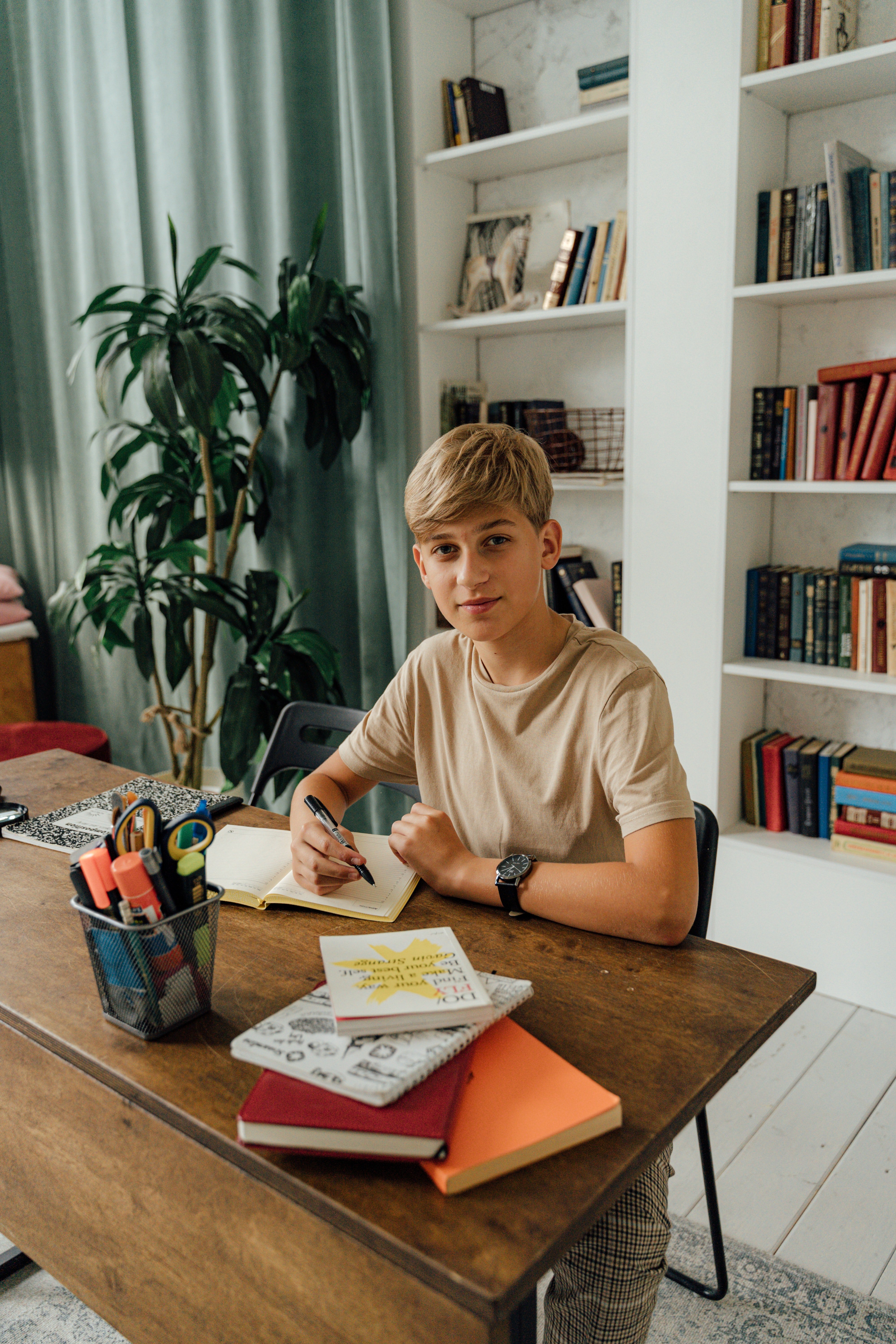 A boy doing his homework. | Source: Pexels/ Anthony Shkraba 
