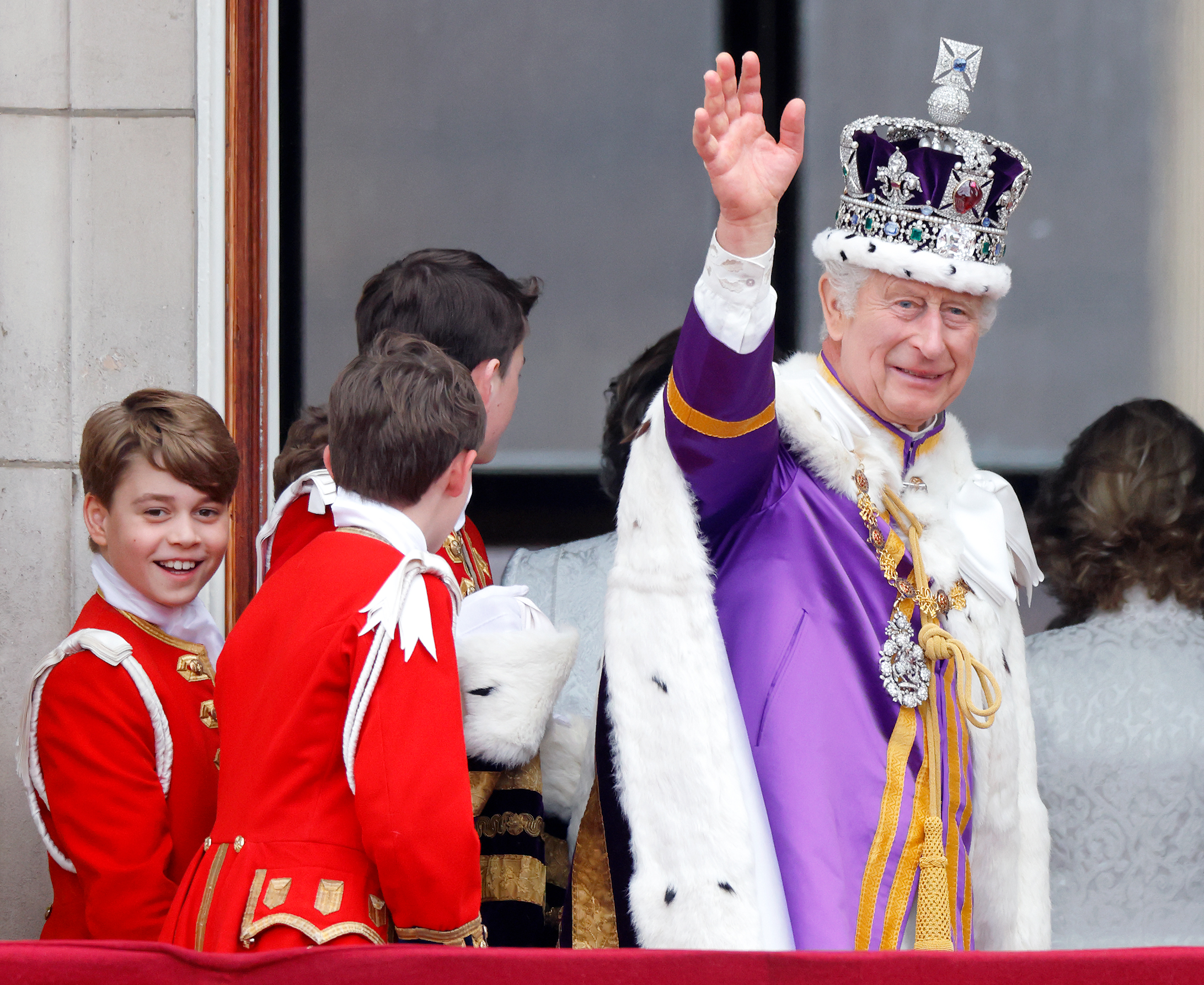 Prince George and King Charles III on the balcony of Buckingham Palace following the Coronation of King Charles III and Queen Camilla at Westminster Abbey on May 6, 2023, in London, England. | Source: Getty Images