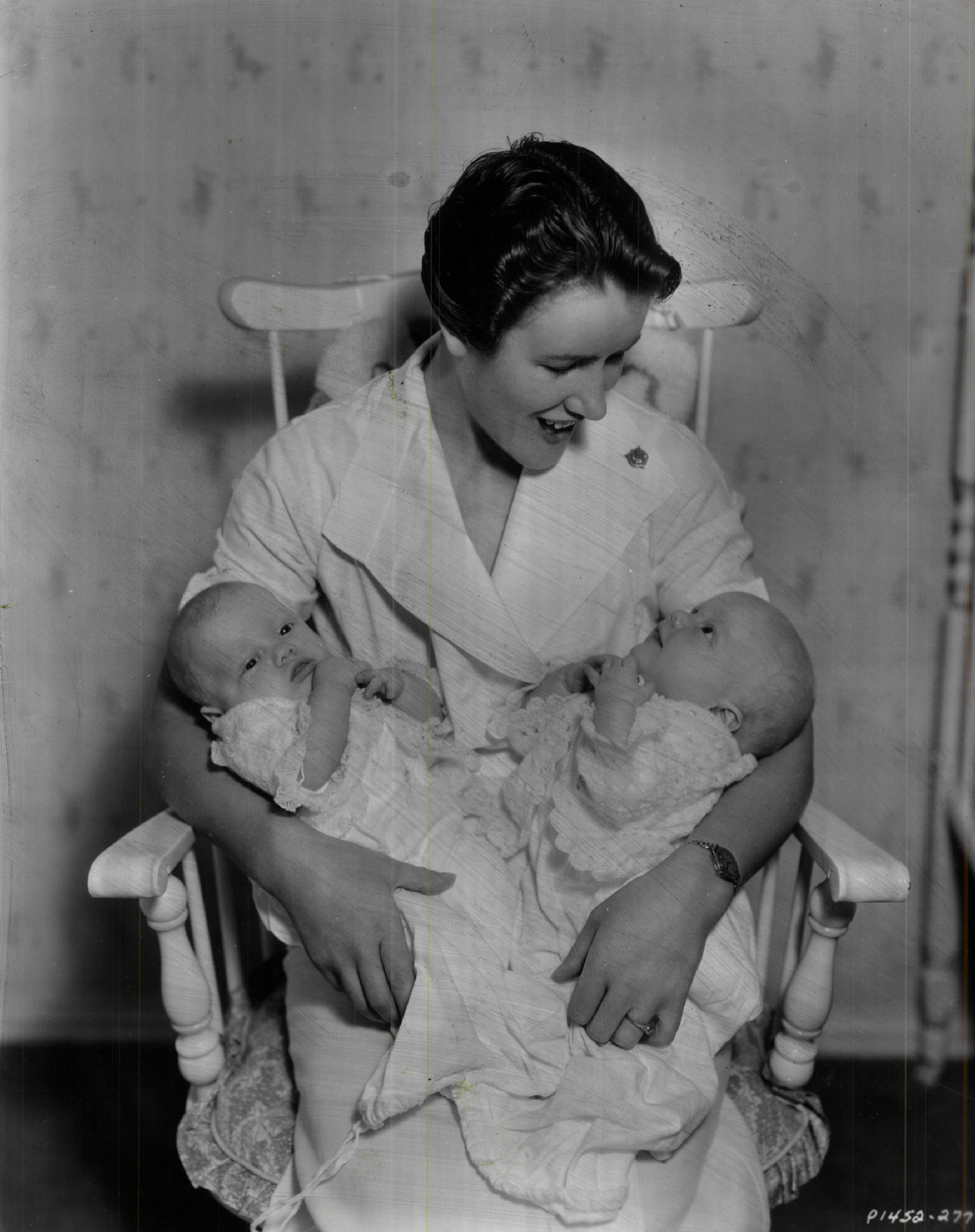 Nurse Cradles Two-Month-Old Crosby Twins. | Source: Getty Images
