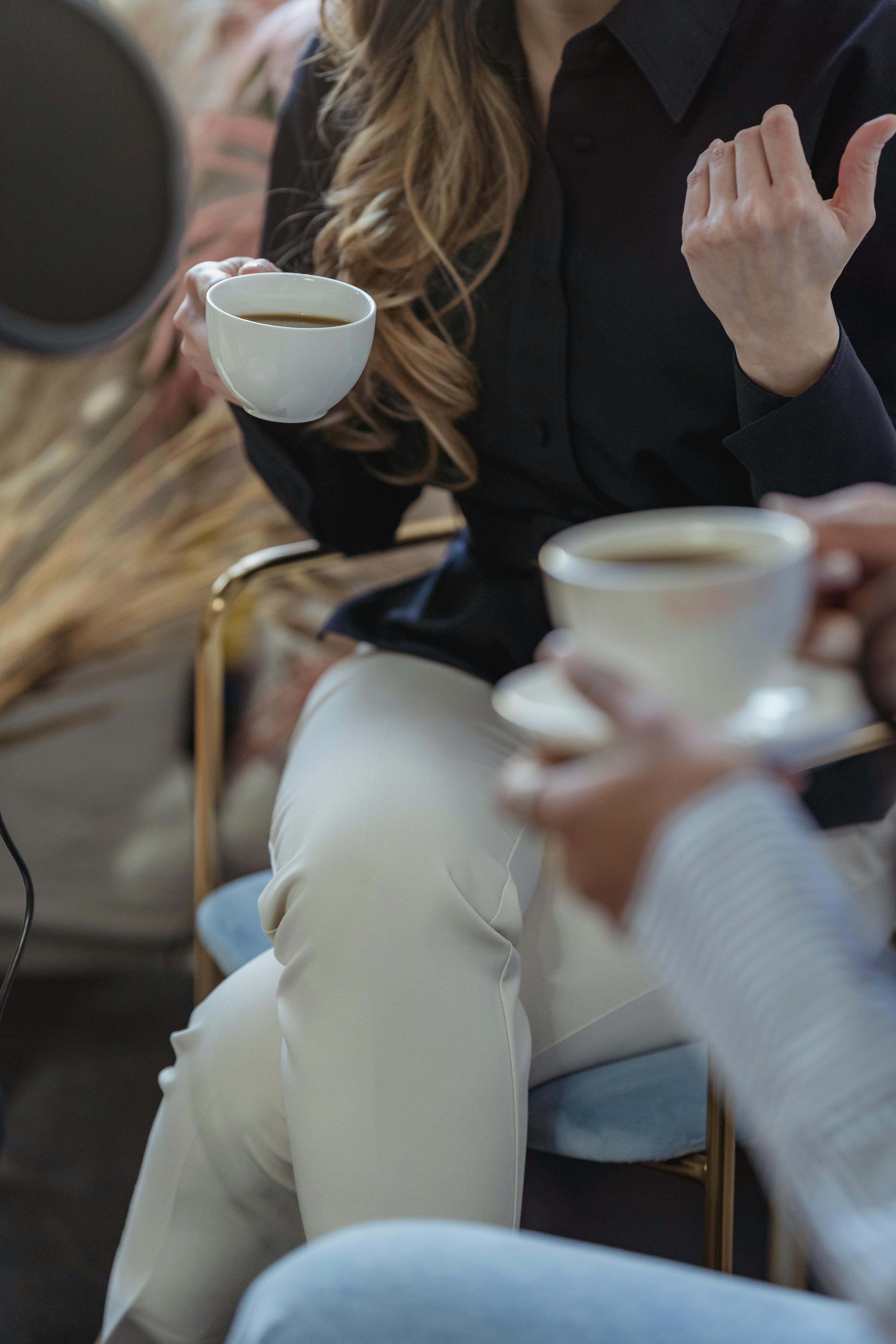 James and Natalie share an intimate moment at the airport coffee shop | Source: Pexels