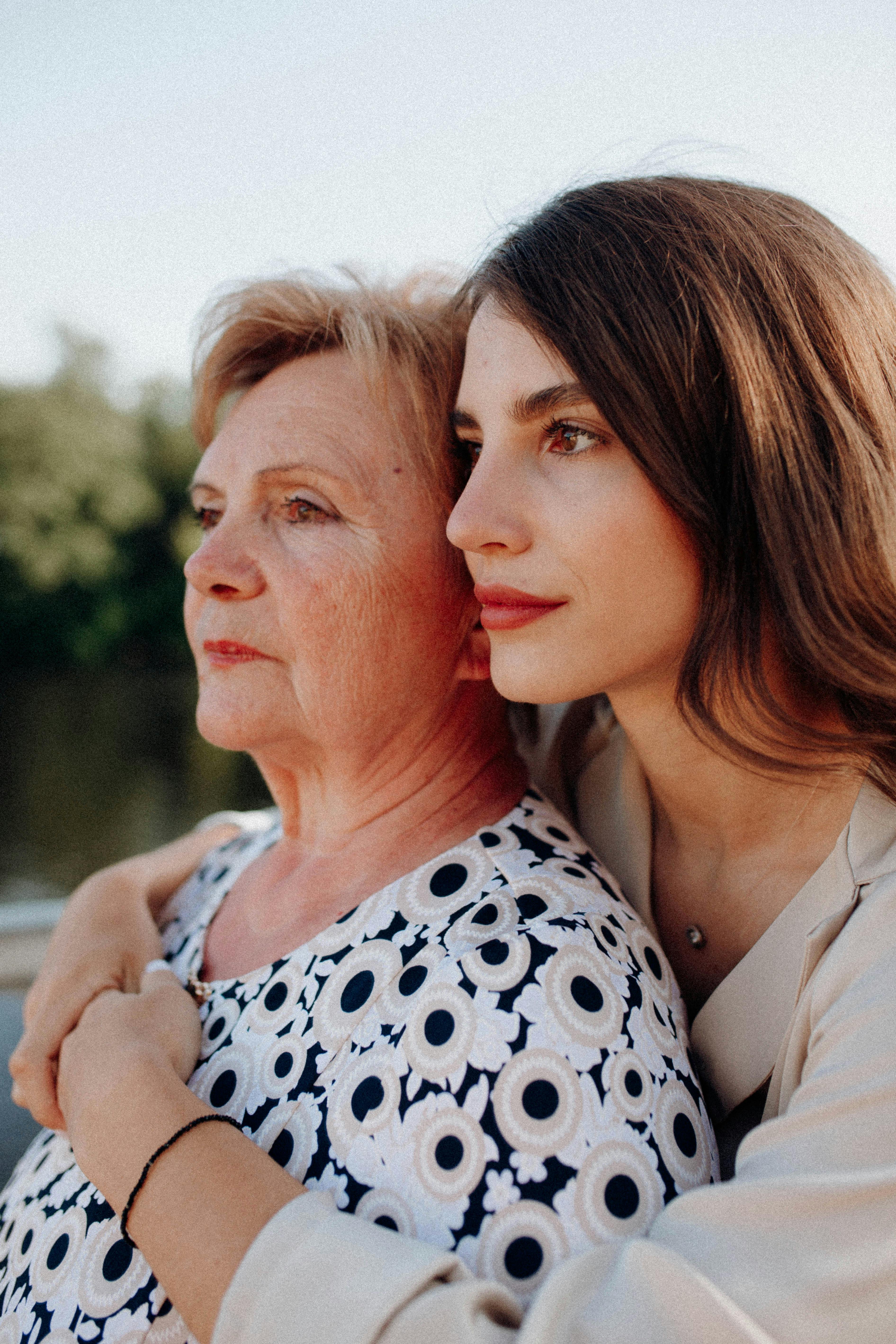 Woman hugs her elderly mother | Source: Pexels