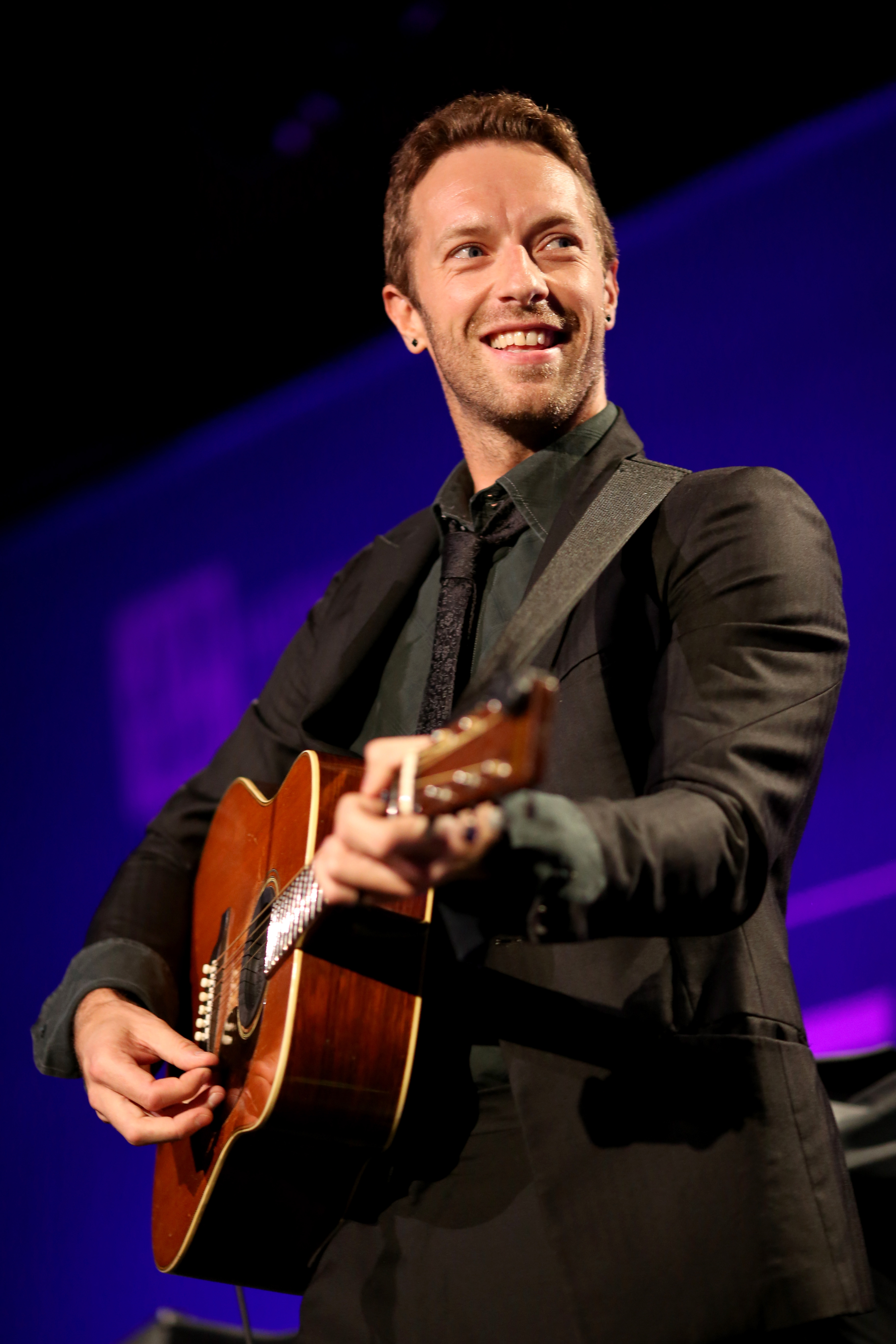 Chris Martin performing with his band Coldplay at the 4th Annual Sean Penn & Friends Help Haiti Home Gala in Los Angeles, California on  January 10, 2015 | Source: Getty Images