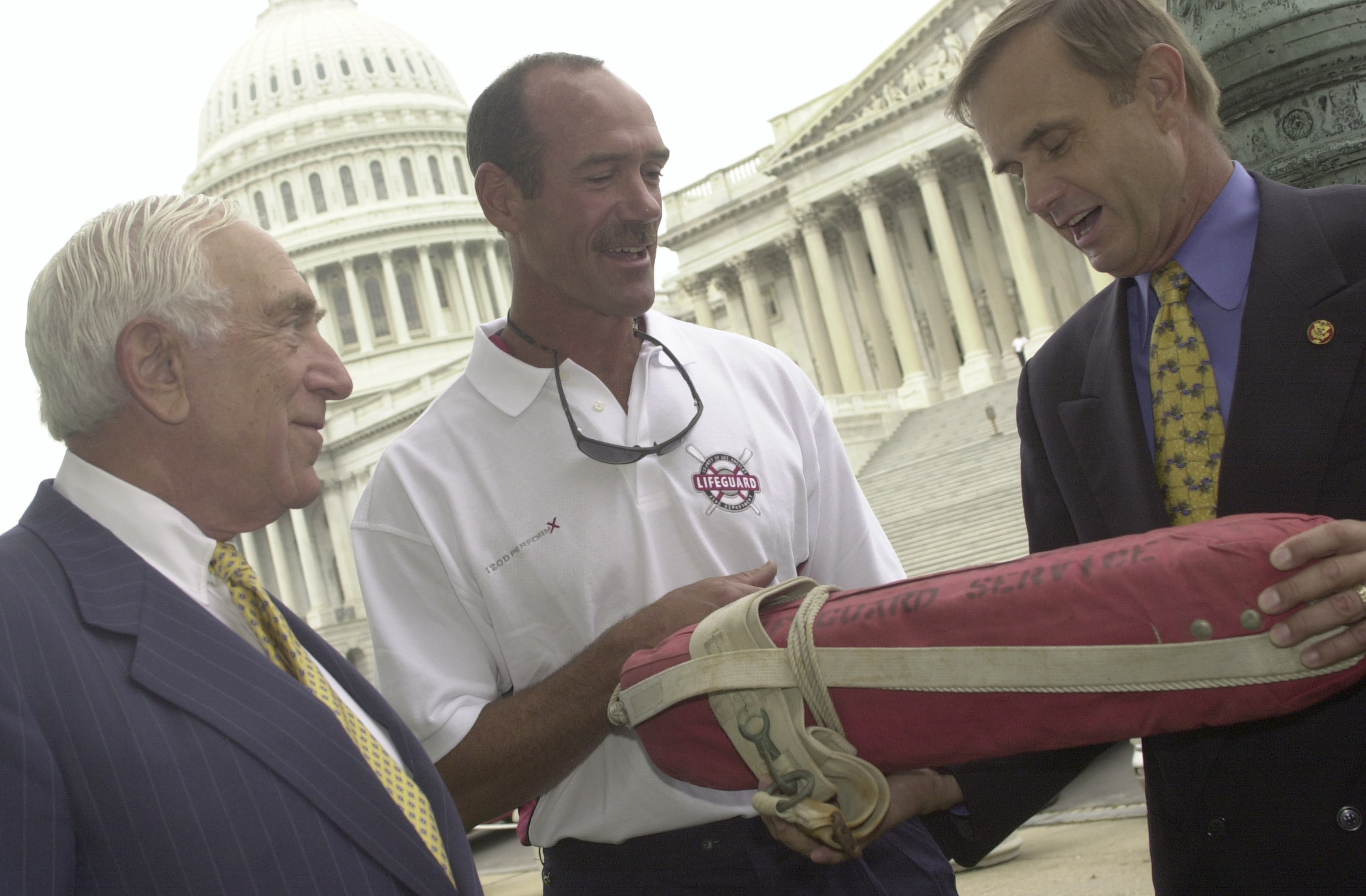 Sen. Frank Lautenberg, Michael Newman, and Rep. Brian Bilbray pictured on July 25, 2000 | Source: Getty Images