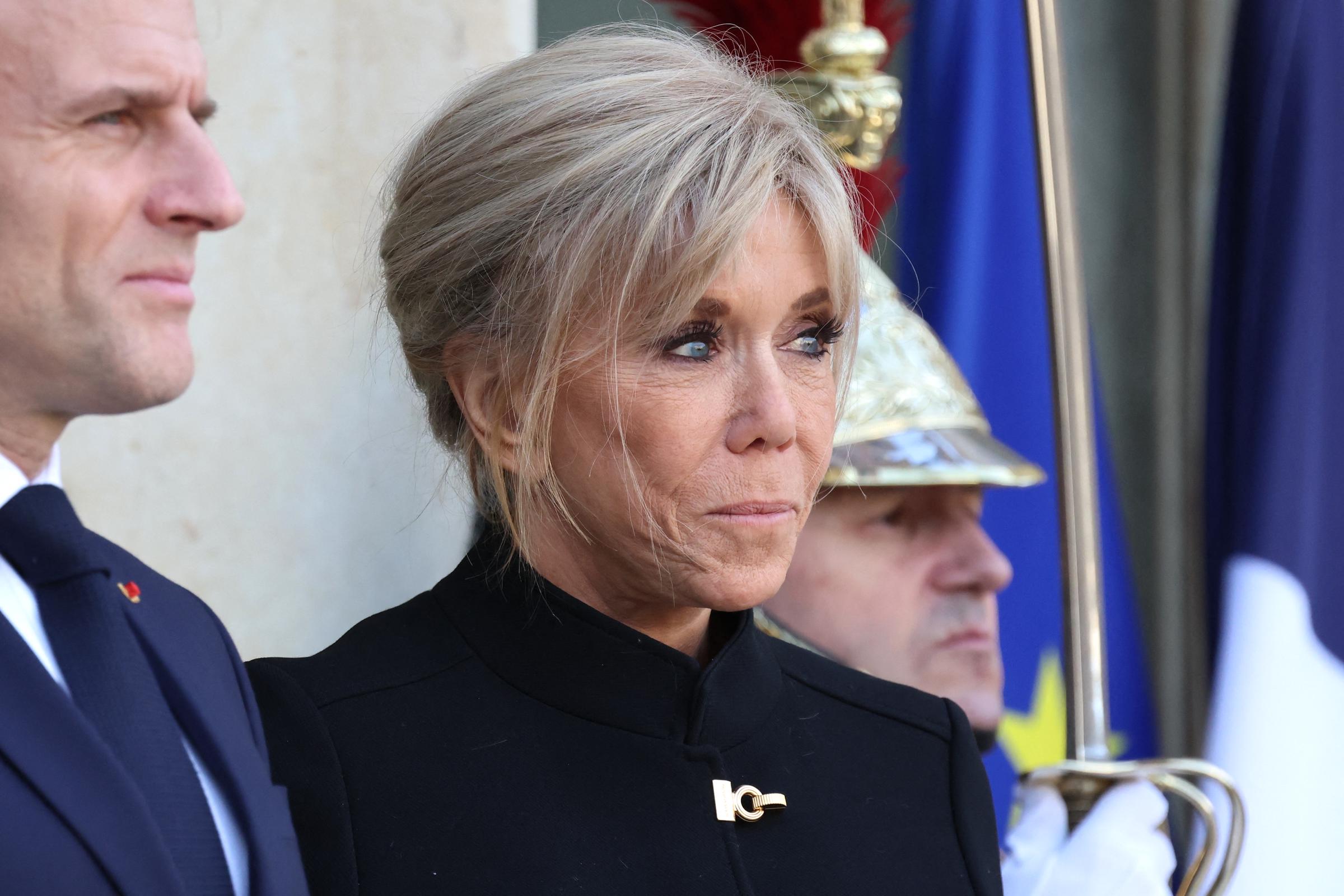 President Emmanuel Macron and his wife Brigitte wait for Spain's King prior to a working lunch at the Elysee Palace in Paris, on January 13, 2026 | Source: Getty Images
