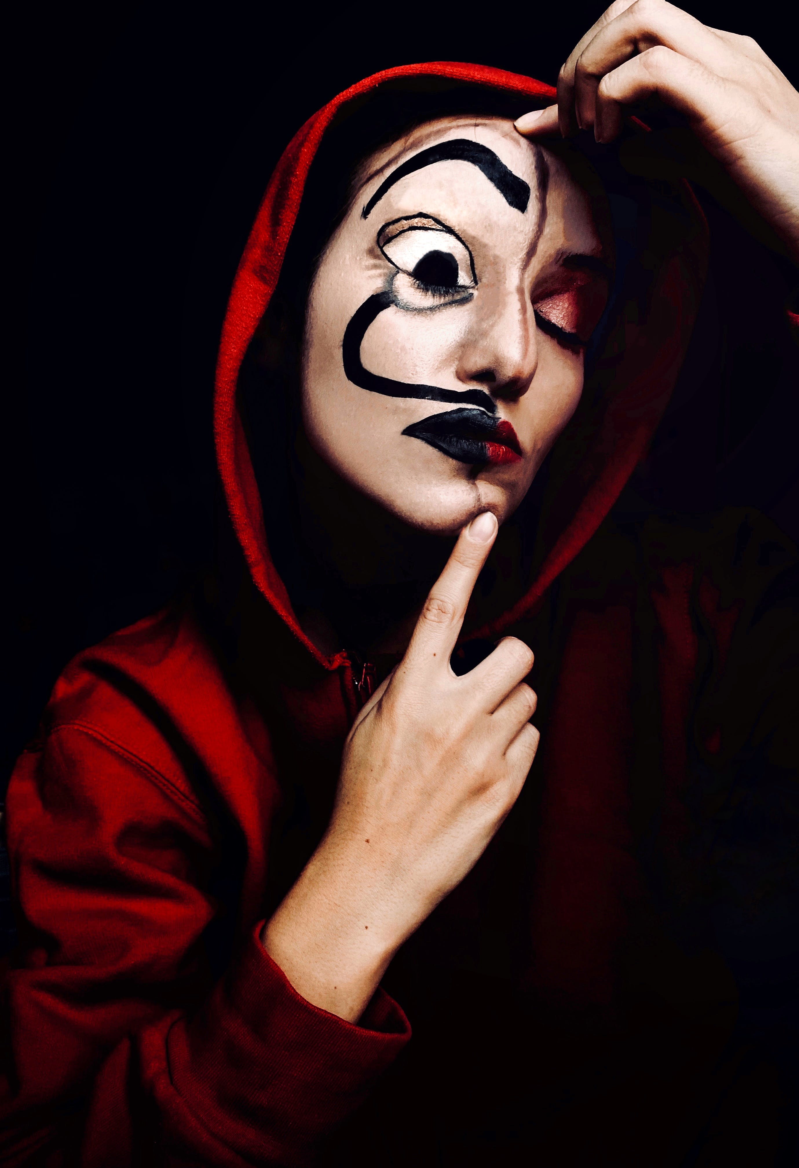 A person wearing a "Money Heist," mask. | Source: Pexels
