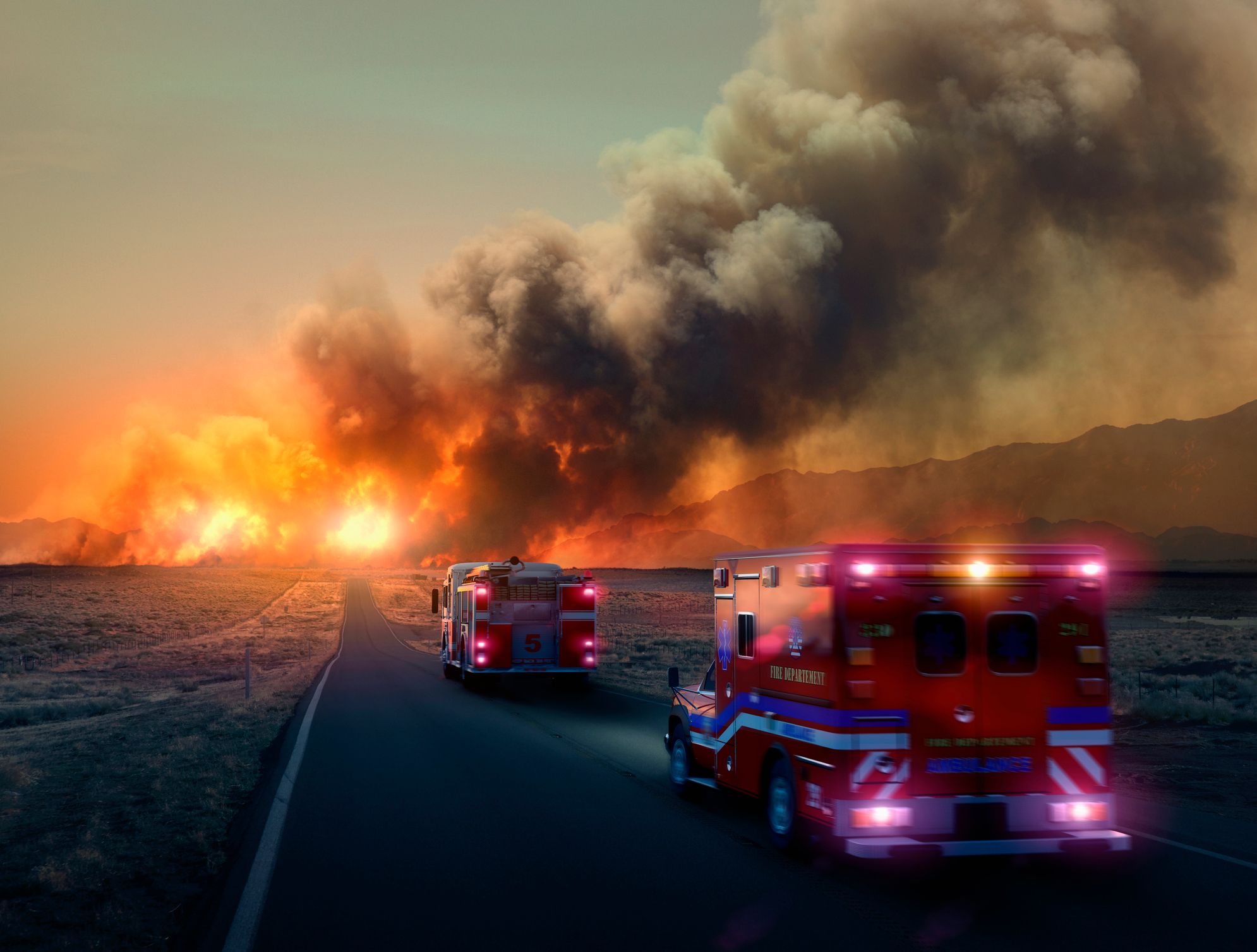 Ambulances going toward a fire in the woods. | Photo: Getty Images