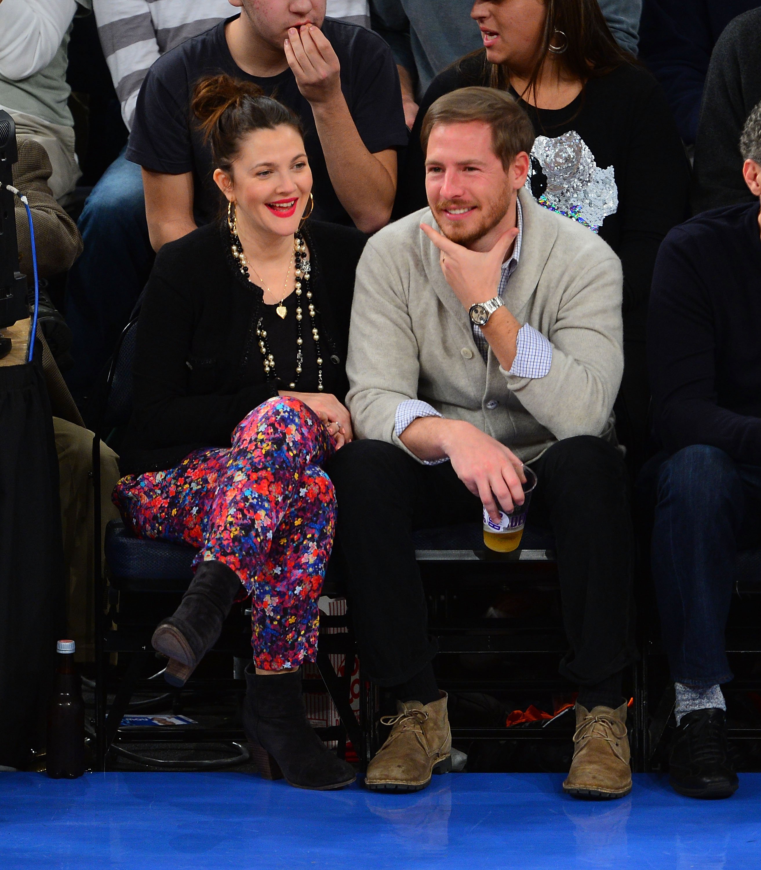 Drew Barrymore and Will Kopelman during the Chicago Bulls vs New York Knicks game at Madison Square Garden on January 11, 2013 in New York City. / Source: Getty Images