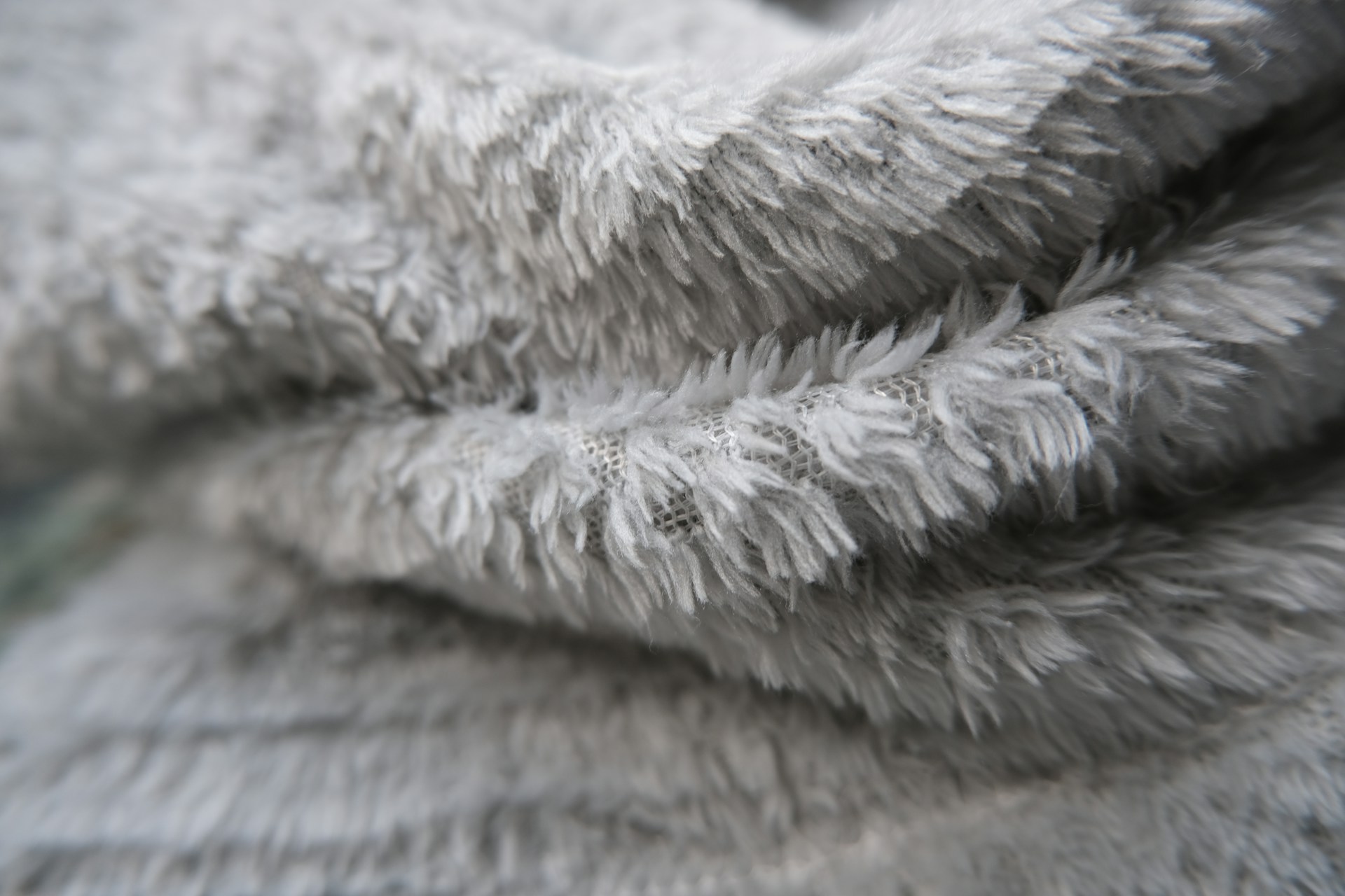 Grayscale shot of a blanket | Source: Unsplash