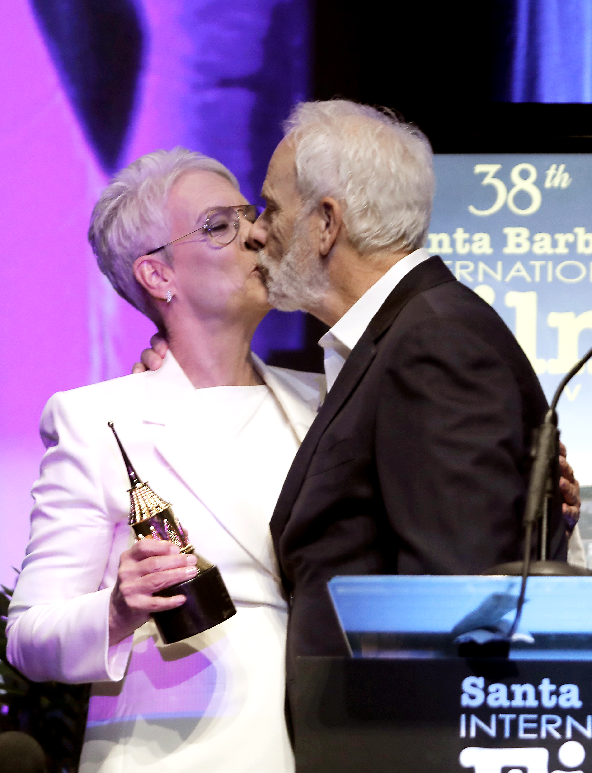 Christopher Guest presents Jamie Lee Curtis with the Modern Master Award at the Maltin Modern Master Award ceremony during the 38th Annual Santa Barbara International Film Festival at Arlington Theatre in Santa Barbara, California on February 11, 2023. | Source: Getty Images
